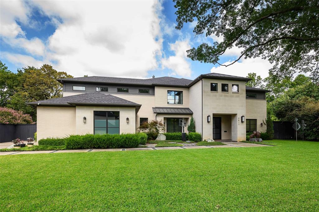 Hidden from the city’s bustle, this exceptional home sits on a serene, tree-lined street in Dallas’ coveted “private school corridor,” backing to a wide greenbelt along Joe’s Creek tributary. Oversized lots and quiet streets create a peaceful setting, perfect for walking, biking, and enjoying the outdoors. A majestic oak tree welcomes you at the entrance.

Designed to embrace its park-like surroundings, the home offers expansive views from every angle. Glass doors in the living room open 180 degrees to a spacious screened porch, creating an extraordinary indoor-outdoor retreat for daily living and entertaining. Thoughtful updates include electric draperies, voice-controlled lighting, and high-end designer fixtures. Outdoor living features a Pavestone terrace, custom fire and water elements, and multiple entertaining areas.

Inside, soaring ceilings and oversized windows fill the home with natural light. The chef’s kitchen boasts dual quartzite waterfall islands, double sinks, Sub-Zero refrigeration, an oversized DCS Fisher & Paykel range with two ovens, Bosch appliances, and sleek cabinetry.

The main level includes a luxurious primary suite with a spa-inspired bath, a private guest suite, and a study. Upstairs, three ensuite bedrooms share a second living area and a large studio overlooking the grounds. The oversized two-car garage is accessed through a mudroom with an adjacent utility room.

Combining tranquility, sophistication, and convenience, this residence is close to the NTTA, Downtown and North Dallas business districts, major medical centers, premier shopping and dining, and easy access to Love Field and DFW airports.