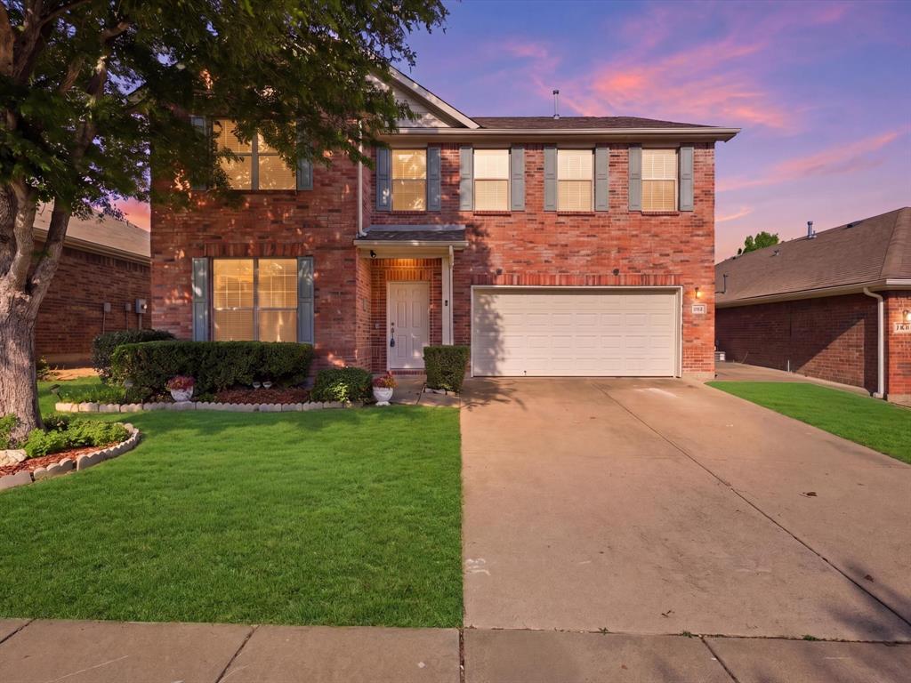 Spacious and inviting 4-bedroom, 2.5-bath home in highly sought-after Keller ISD offering a functional layout and great everyday living. The oversized primary suite provides a true retreat with a large bedroom and an ensuite bath featuring a garden tub, separate shower, and ample space to unwind. The open concept kitchen flows seamlessly into the living area and includes a breakfast bar, ceramic tile flooring, and plenty of room for gathering and entertaining. The living room features a cozy brick hearth fireplace and is filled with natural light throughout. This home is prewired for a home theatre setup, making it easy to create the perfect media or game space. Secondary bedrooms are generously sized, offering flexibility for family, guests, or a home office. Step outside to a covered patio ideal for relaxing evenings or weekend get-togethers. Conveniently located near shopping, dining, and major highways, this home combines comfort, space, and location in one solid package.