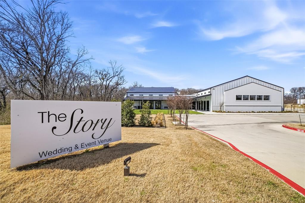 410 S. Paschall Rd, Sunnyvale, TX is a rare opportunity to acquire a premier events facility in one of Dallas County’s fastest growing and most affluent suburbs. Situated on 3.092 acres, the 12,814-square-foot venue is just 20 minutes from Dallas and less than .25 miles from U.S. Highway 80, with surrounding traffic counts exceeding 80K VPD. The property offers exceptional regional accessibility with the privacy ideal for weddings, worship, and special events. Designed for up to 250 guests, the facility features an open-concept main hall with 30’ ceilings, a bridal suite, groom’s suite with four-hole putting green, restrooms, bar area, catering kitchen, floral cooler, and multiple storage areas to support full-service event operations. Exterior amenities include an AstroTurf patio to reduce mud and maintenance issues, and 97 paved parking spaces plus additional shared parking. Utilities are fully connected, including city water and sewer, electricity, propane gas service, and central HVAC, supported by 7 rooftop units and separate cooling system for the side building. Zoned Highway Commercial, permitted uses include event venue, church, daycare or private school, restaurant, dance hall, or other retail, service, or office uses, with some light industrial uses possible via special permit. With its scale, parking ratio, strong visibility, and flexible zoning, this asset offers compelling long-term operational and investment upside.