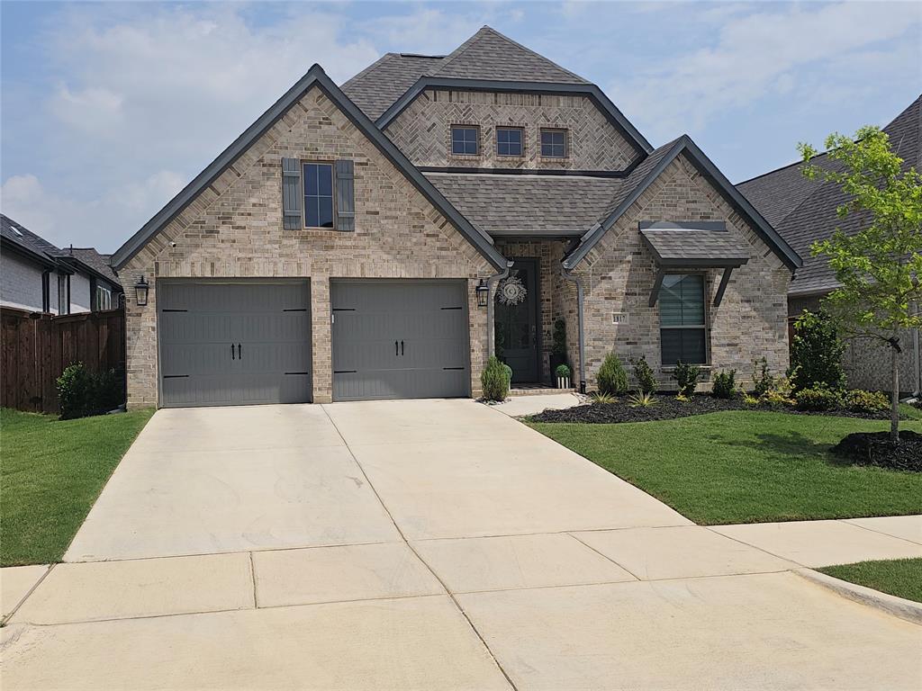 Imagine coming home to a place where every detail was designed to make life feel easier, more beautiful, and more meaningful. Welcome to this stunning 2024 Perry Home in the highly sought-after M3 Ranch community in Mansfield.

From the moment you walk through the door, you’re greeted by soaring 12-foot ceilings, natural light pouring through a wall of windows, and a warm, open layout that instantly feels like home. The spacious living area with a cozy fireplace flows seamlessly into a chef-inspired kitchen featuring a large island, granite finishes, and a walk-in pantry—perfect for everything from quiet mornings to hosting family and friends.

The private primary suite is your personal retreat, offering a spa-like bathroom with dual vanities, a soaking garden tub, and a separate shower—your space to unwind at the end of the day. With 4 bedrooms, 3.5 baths, and a dedicated home office with French doors, there’s room for everyone to live, work, and grow comfortably.

Step outside to your covered patio and imagine relaxing evenings, weekend gatherings, and peaceful moments under the Texas sky.

Beyond the home, you’ll love being part of Mansfield—known for its strong sense of community, beautiful parks, and access to highly regarded Mansfield ISD schools. With shopping, dining, and major highways just minutes away, everything you need is right at your fingertips.

This isn’t just a house—it’s where your next chapter begins.

Homes like this don’t last. Schedule your private tour today and experience it for yourself before someone else calls it home.
