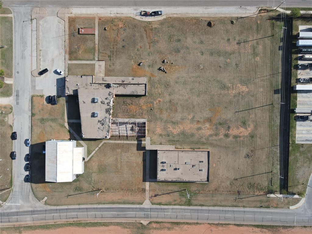 Prime 3.6+ Acre Commercial Site in Growing Abilene Market! Excellent visibility and access just off I-20, adjacent to the new QuikTrip with high traffic volume. Allowing for a wide range of commercial uses. Property is currently income-producing with a gym tenant in place. An additional building fronting I-20 includes six office suites (~750 SF each), available for lease at $5,000 month for the building. Owner is willing to add a parking lot and new entrance—ideal for office or daycare use. Strong development potential. Available for sale or lease. Agent is Related to Seller.