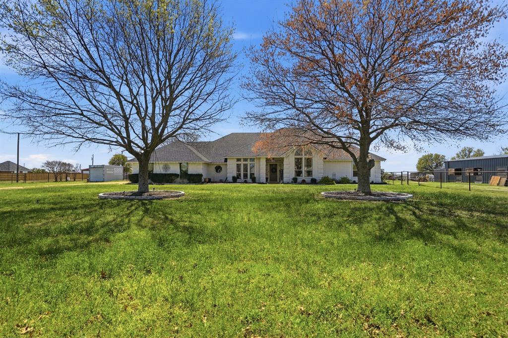 Welcome to the perfect blend of comfort, space, and Texas charm in the heart of it all! This inviting property is a rare find and equestrians dream! Ideal for those seeking a serene lifestyle without sacrificing convenience. Inside you'll find an inviting, cozy layout with spacious living areas filled with natural light and a functional flow perfect for everyday living and entertaining. The kitchen features ample counter space, storage, and double Viking ovens making it the true heart of the home. Generously sized bedrooms provide a relaxing retreat, while the primary suite offers privacy and comfort. What truly sets this property apart is its exceptional equestrian setup. Enjoy a 3-stall barn complete with a wash bay and tack room, 6 turnouts with loafing sheds, and an outdoor riding pad- designed for both horse and rider. This ranchette provides plenty of room to relax, entertain, or fully embrace the equestrian lifestyle. Conveniently located near shopping, dining, and major hwys making work commutes a breeze. This property offers peaceful country living with city amenities just minutes away. A true horse lover's dream in the heart of it all. Don't miss this unique, one of a kind opportunity!