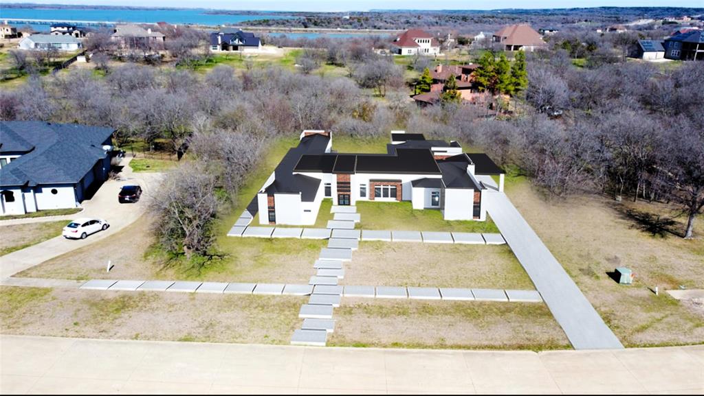 Build your dream home on this 1.47-acre lot near Joe Pool Lake! This south-facing lot has abundant trees for you to design your home around and is surrounded by many beautiful estate homes. Enjoy the beautiful sunsets in the backyard.