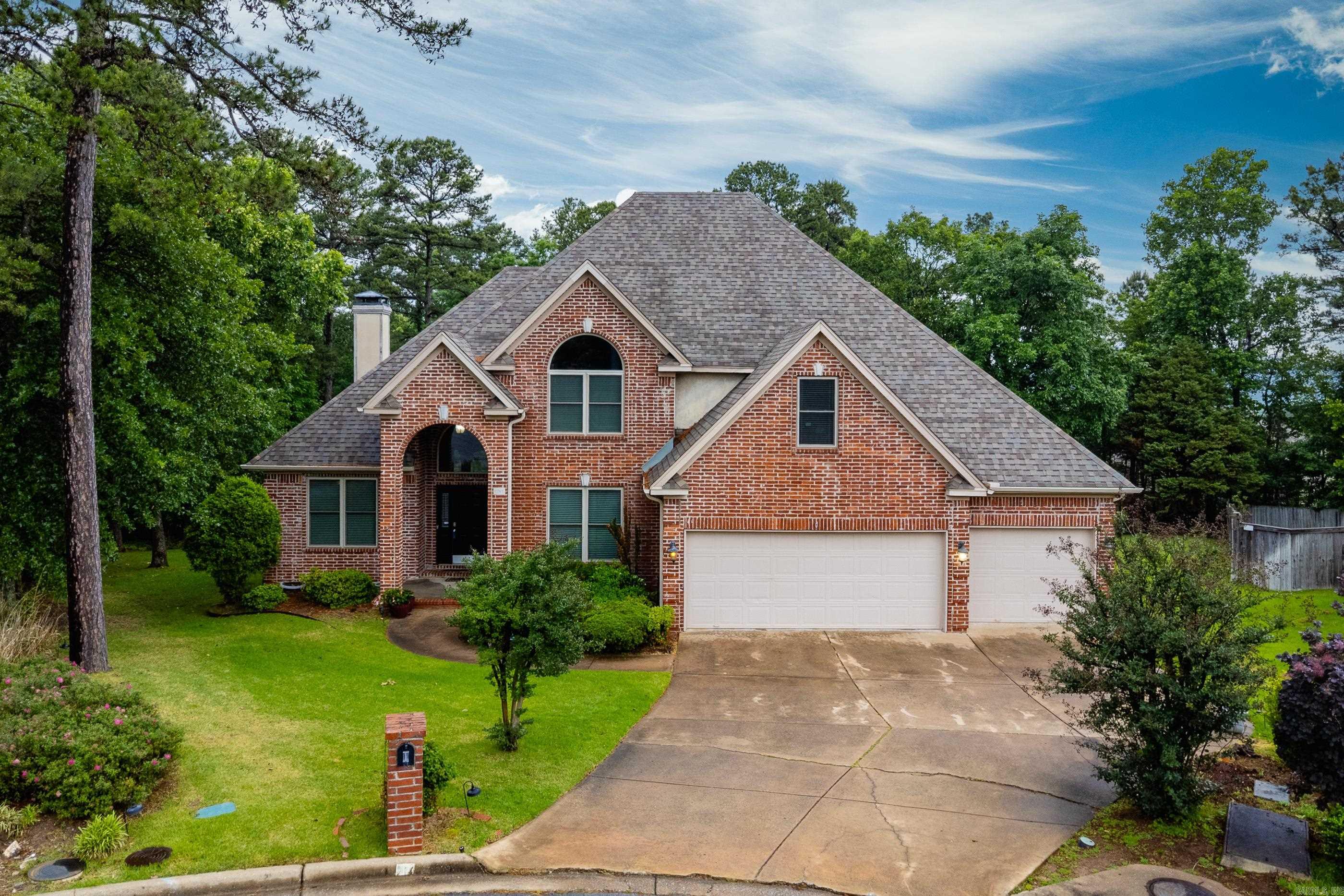 Beautiful all brick home on a large lot with mature trees, pretty landscaping, and backing to green space. Inviting two story foyer opens to formal living and dining spaces along with a spacious great room featuring tall windows, abundant natural light, custom cabinetry, and fireplace. Updated eat in kitchen offers a center island, informal dining area, newer stainless appliances, updated flooring, granite countertops, and backsplash. Recent updates also include newer carpet and paint plus new insulated windows across the front of the home. Main level primary suite features an updated spa inspired bath with soaking tub, large shower, and great storage. Upstairs offers three guest bedrooms, two full baths, and a large bonus/game room that could also serve as a fifth bedroom. Excellent storage throughout and oversized 3 car garage. Wonderful outdoor spaces and a private setting make this home perfect for entertaining or everyday living. Come see!