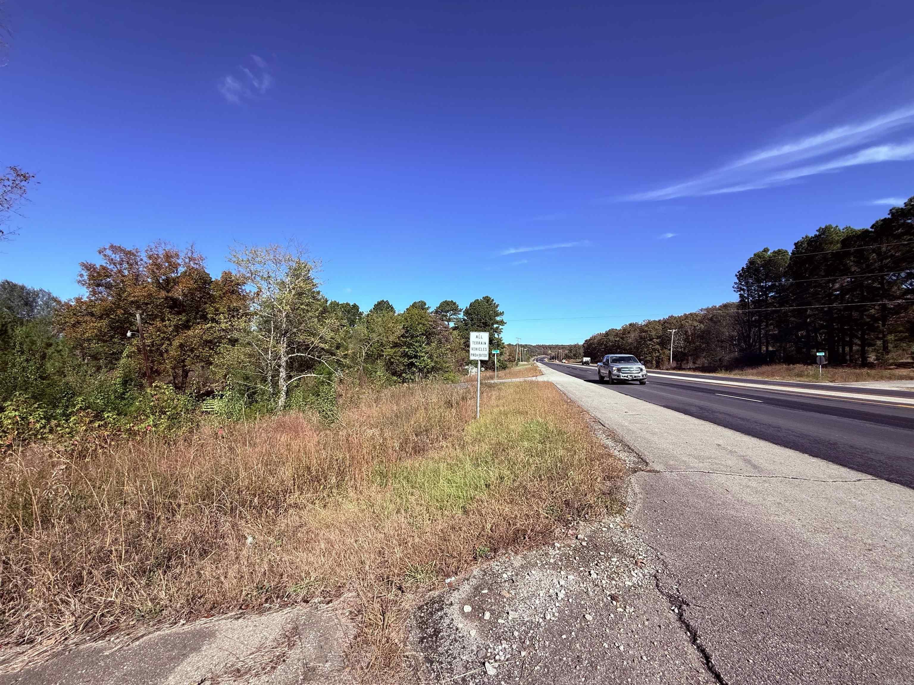1.42-acre unrestricted parcel with direct highway frontage on one of Arkansas’s busiest routes, featuring approximately 9,100 vehicles passing daily. This high-visibility property offers exceptional potential for commercial use, investment opportunities, or personal development. The unrestricted status allows for a wide range of possibilities, including establishing a business, placing multiple mobile homes for rental income, or building a residence with room for gardening, livestock, and outdoor space.  Conveniently located minutes from both Bald Knob and Searcy, and approximately one hour from Little Rock, the site provides easy access while maintaining a flexible rural setting. Owner financing is available, offering an additional opportunity for buyers seeking versatile land with strong highway exposure in central Arkansas.  *Some utilities available at property.