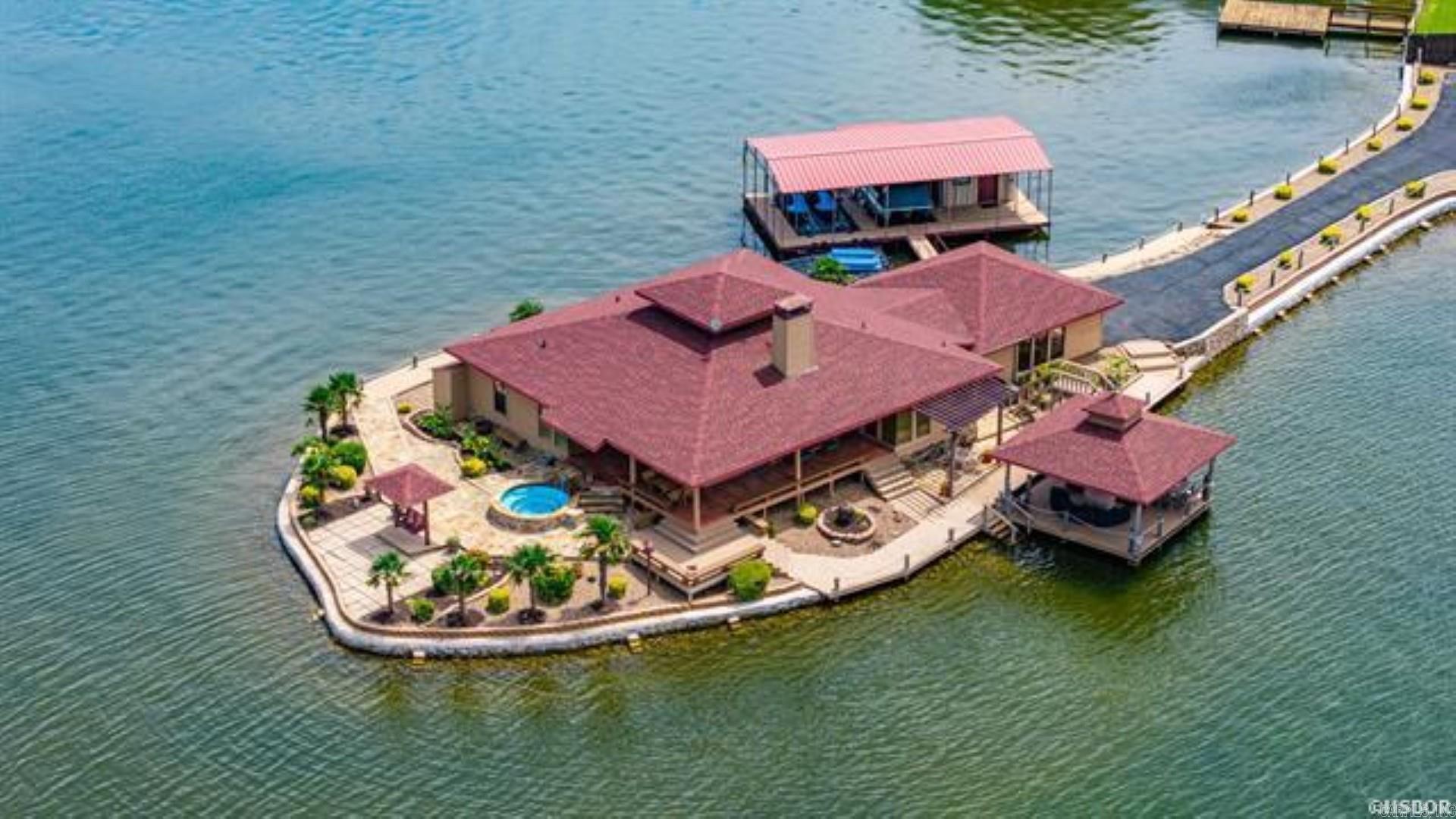 Welcome to 106 Farr Shores Bay, an extraordinary lakeside sanctuary nestled on a private peninsula with 600 feet of pristine shoreline. This one-of-a-kind property offers breathtaking panoramic views of Lake Hamilton, making you feel as if you’ve escaped to your own personal island.    This 1,900 sq. ft. single-level home features a wood-burning fireplace, central heating and air, and a spacious two-car carport. Thoughtful updates, including a new seawall (2021), new roof (2023), newly paved driveway (2023), and fresh siding and paint (2024), ensure modern comfort and low-maintenance living. Homes like this—where tranquility meets adventure—are a rare find. Don’t miss your chance to own this stunning, one-of-a-kind lakefront property. Schedule your private showing today!