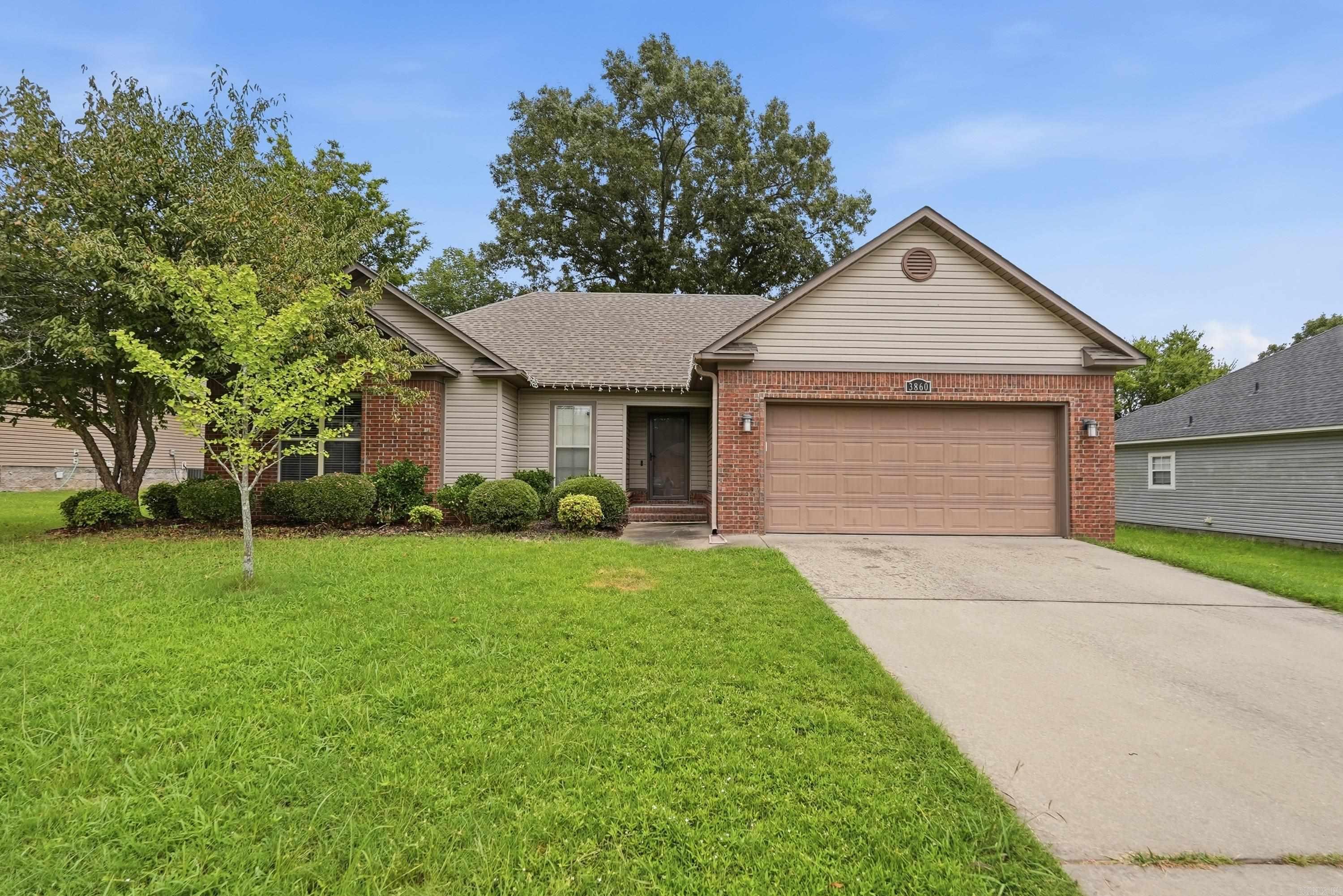 Welcome to 3860 Lazy Creek Trail in Conway, Arkansas, located in the desirable Shadow Ridge neighborhood between Conway and Greenbrier. Homebuyers searching for move in ready homes in Conway AR with a private backyard and convenient location will appreciate everything this home has to offer. This one level 3 bedroom, 2 bathroom home features a desirable open split floor plan with tray ceilings in both the living room & primary suite. The kitchen offers granite countertops, abundant cabinetry, stainless steel appliances, an eat in dining area, and the refrigerator is included. The spacious primary suite features dual vanities and a huge walk in closet. One secondary bedroom includes a Murphy bed, making it ideal as a guest room, office, or flex space. Step outside to a large fully fenced backyard that backs to mature trees for added privacy. Enjoy relaxing or entertaining on the patio surrounded by a plum tree, herb garden, and blackberry vine. Conveniently located near Conway schools, shopping, dining, and just minutes from Greenbrier, this home offers the perfect blend of comfort, privacy, and convenience. Schedule your private showing today and see why this home stands out.