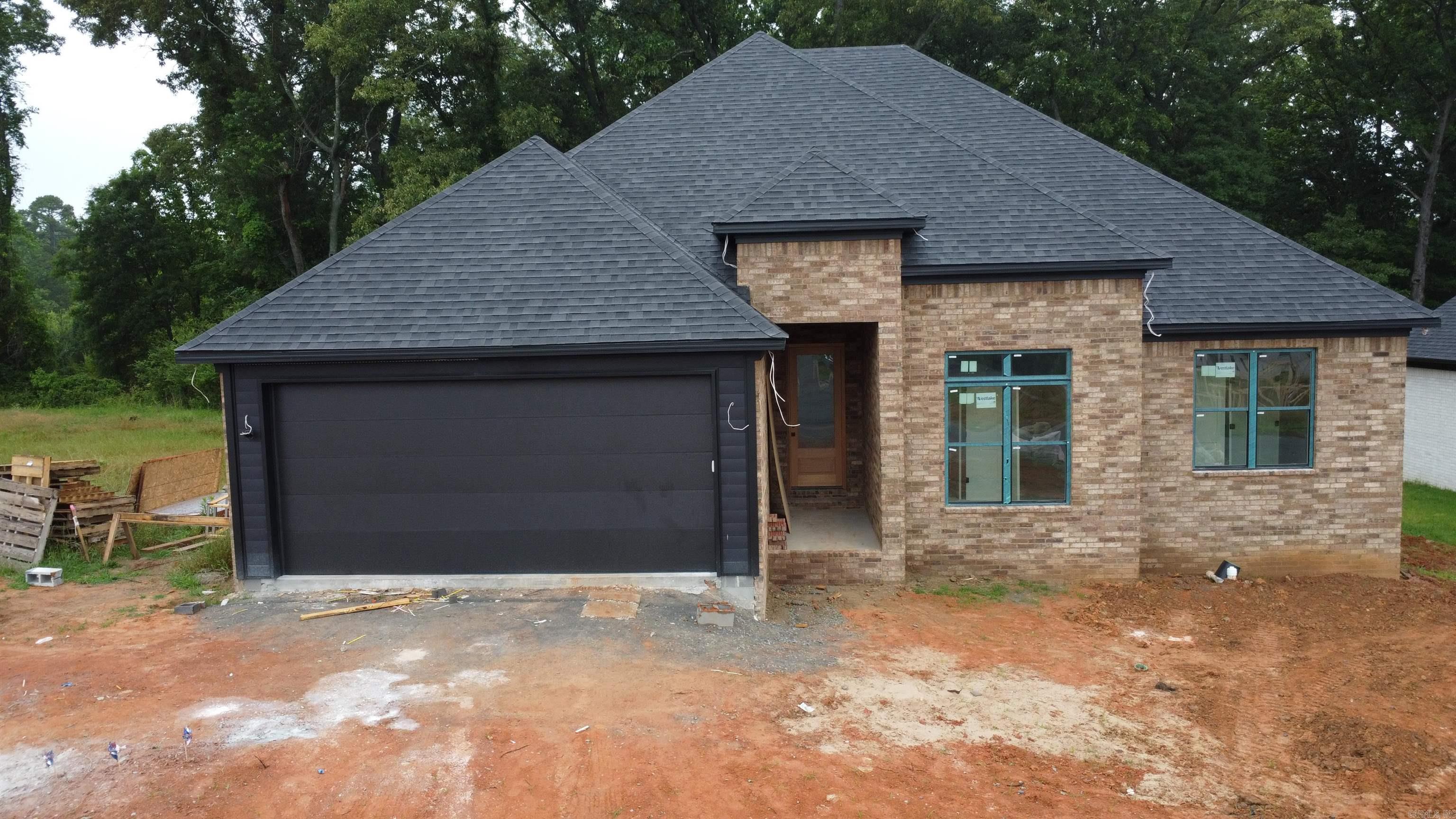 Bringing back a traditional look with some modern twist. Paragon Builder’s 18 Avondale project is the home you’ve been waiting for. 4 ceiling height changes, 4 bedrooms & 2 full bathrooms are your starting point. Setting on 2250sqft (H/C) this home has made great use of a smaller space. 14 foot foyer entry ceiling, 12 foot foyer interior ceiling & 4th bedroom , 10 foot living area & 9 foot everywhere else! Making this home feel grand. Open concept living/dining/kitchen with a walk in pantry & large laundry room. All exterior walls insulated (incl. garage & garage door), Owen’s Corning shingles, & an oversized footing with compacted screenings for the slab, no red dirt in our fill. Dual fuel HVAC system, tankless water heater, fireplace & range are all on gas. Home will come with a fenced backyard & dark slate kitchen appliances. Master suite has a tray 10/9 ceiling with a spacious bathroom & roomy walk in closet. *Interior pictures coming this week* *Estimated completion is end of June/early July*