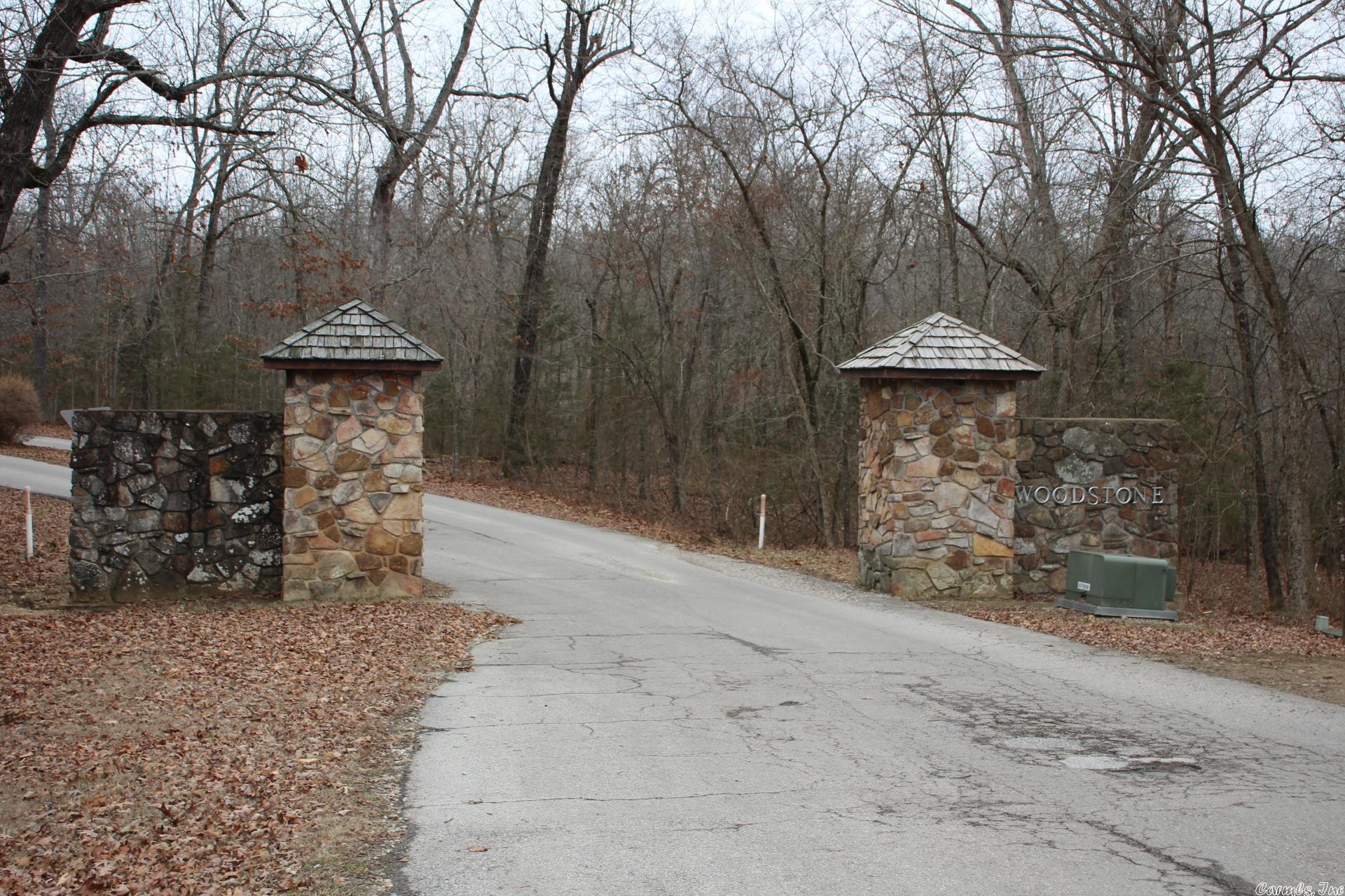Large wooded lot with seasonal lake view. Just minutes to Bull Shoals Lake and White River. Nice building site with all city utilities available.