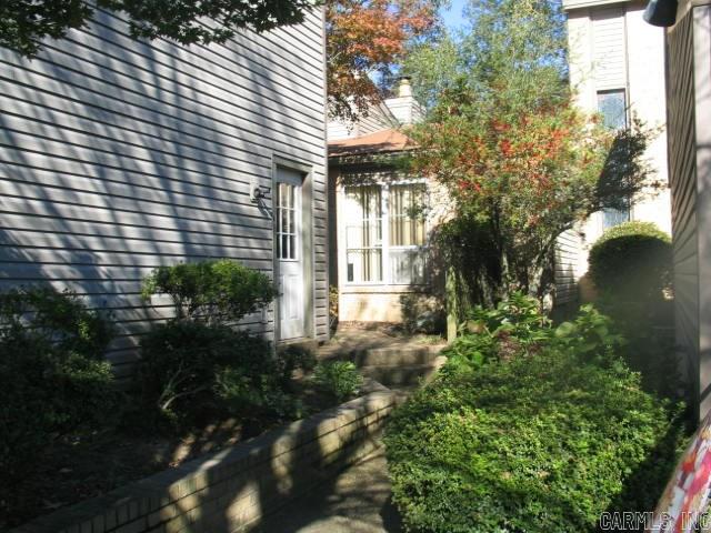 Cute Condo in Indian Hills, Two bedroom two bath, Fireplace Eat in Kitchen, Fenced patio which leads to the pool.  Two gar garage. Needs a little TLC