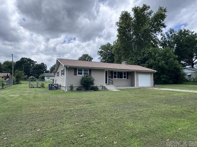WHAT A DEAL! Located in town and close to the hospital, employment, shopping and schools. This home has many recent updates and is ready for you to make it your own! Gas Fireplace in the living room, spacious primary bedroom with access to the fenced back yard! You will love how clean and neat this home is. Call to schedule a look before you miss out on this wonderful home! Brown Shed does not convey.