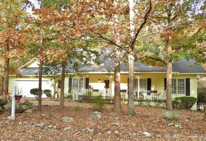 Beautiful Country Home well appointed on a level lot in the Cortez Golf Course neighborhood.  Enjoy your outdoor living in the charming covered front porch or back covered patio w/a fenced-in yard.  Great amenities include an open living room w/hardwood floor & fireplace, dining area w/bay windows, bonus room by the kitchen, office, ample floored attic storage space & an individual storage building.  Master suite features step-in shower, garden tub, built-ins and walk-in closet. See Agent Remarks.