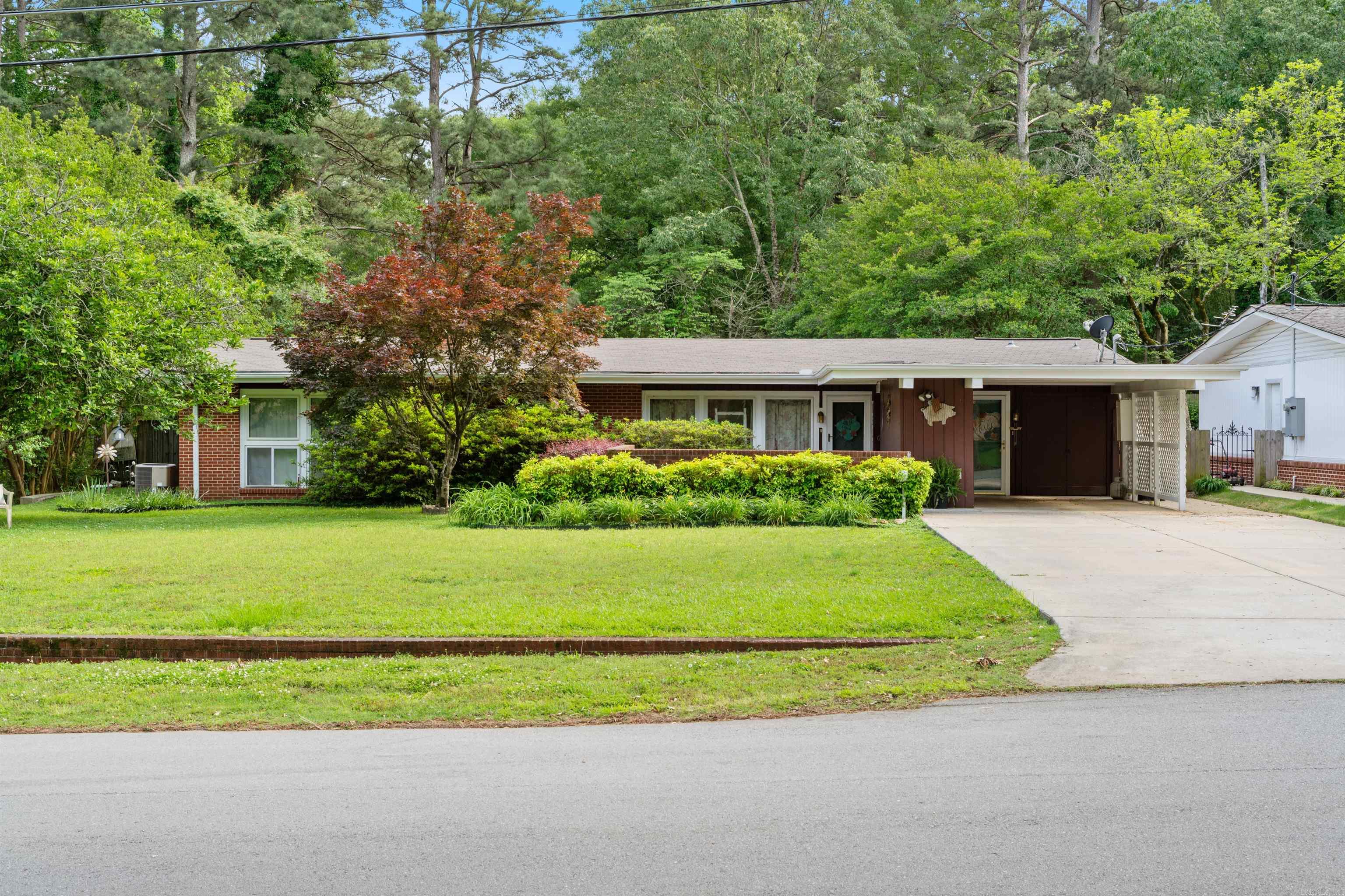 Welcome to this beautifully maintained 3-bedroom, 2-bath home that offers generous living space and timeless charm. Flooded with natural light, this home features multiple living areas perfect for family gatherings and very day comfort. The expansive great room showcases stunning tongue and groove ceiling with beams and a cozy fireplace, creating a warm and inviting atmosphere.  Enjoy outdoor living at its finest with a large backyard oasis, complete with a sparkling in-ground pool—ideal for entertaining or relaxing in privacy. Ample storage throughout the home ensures everything has its place. From its thoughtful layout to its charming details, this home is move-in ready and perfect for making lasting memories.