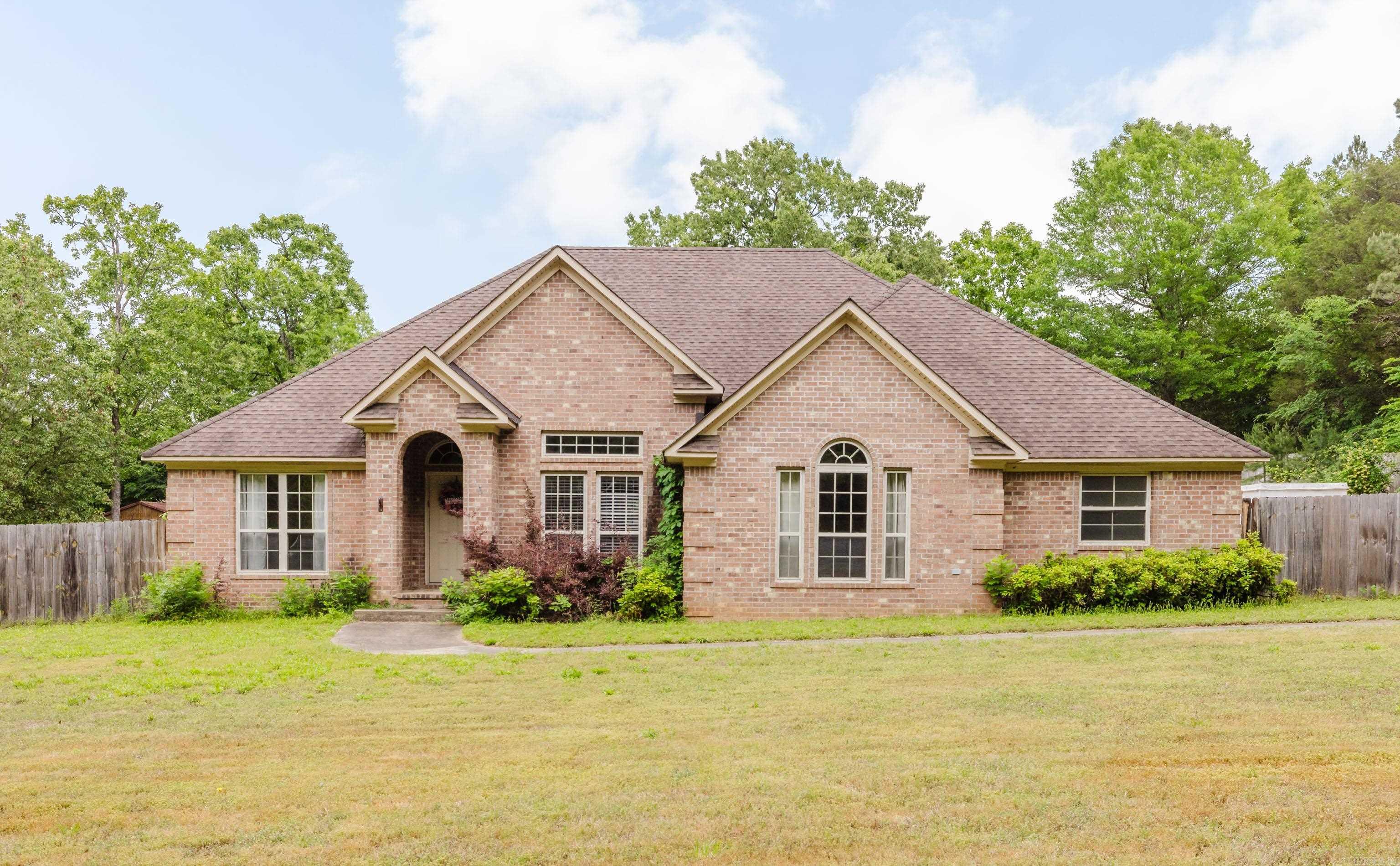 Beautiful all brick home in the Treasure Hills Subdivision just outside Conway. The large lot boasts just over an acre and has a separate small workshop ready for you to utilize for any hobbies you may have. The split floor plan has 3 bedrooms, 2 bathrooms, separate dining, breakfast area and a large great room for spending time with friends and family. Enjoy the outdoors from the patio and the privacy fenced back yard. A two-car side load garage completes the property and is located behind the privacy fence. According to the seller: Stove and microwave were replaced in 2024 and dishwasher in 2023. Call me or your agent today to set up your private showing. AGENTS: Please schedule showings through Broker Bay and please see confidential remarks.