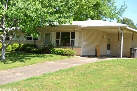 Nice 3 bedroom, 1 bath, house on corner lot. Great for first time buyers, downsizers, or investors. New paint inside, New HWH 2 yrs ago, Vinyl flooring in kitchen/dining area and bath, carpet over wood floors in living room and bedrooms. Washer and Dryer convey at no cost. Nice kitchen cabinets. Good sized closets for storage. Brick and vinyl siding exterior for low maintenance. Nice private backyard w/ chain link fence, large covered patio, and storage bldg. Requires flood insurance if mortgaged.