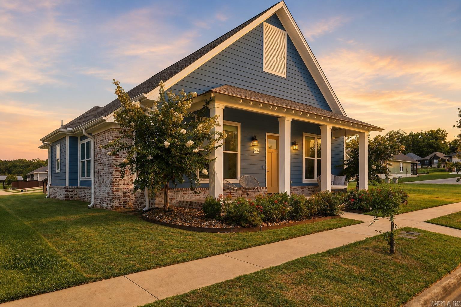 Southern Living style meets everyday comfort in this magazine worthy Craftsman home in Bryant. Offering 3 bedrooms, 2.5 baths, and 2,154 square feet, the home is filled with designer finishes, custom beam work, tall ceilings, abundant natural light, and charm in every room. The open layout flows beautifully from the spacious kitchen into the dining and living areas, creating an inviting setting for entertaining or quiet evenings at home. A spa inspired primary bath, thoughtful lighting, generous storage, and distinctive architectural details add to the appeal. Outside, the welcoming front porch captures the best of front porch living, while the community pool, neighborhood green space, and additional amenities make every day feel a little more like vacation. Conveniently located with an easy commute to Little Rock, this stylish, character filled home offers the perfect blend of comfort, design, and location. Truly a showstopper!