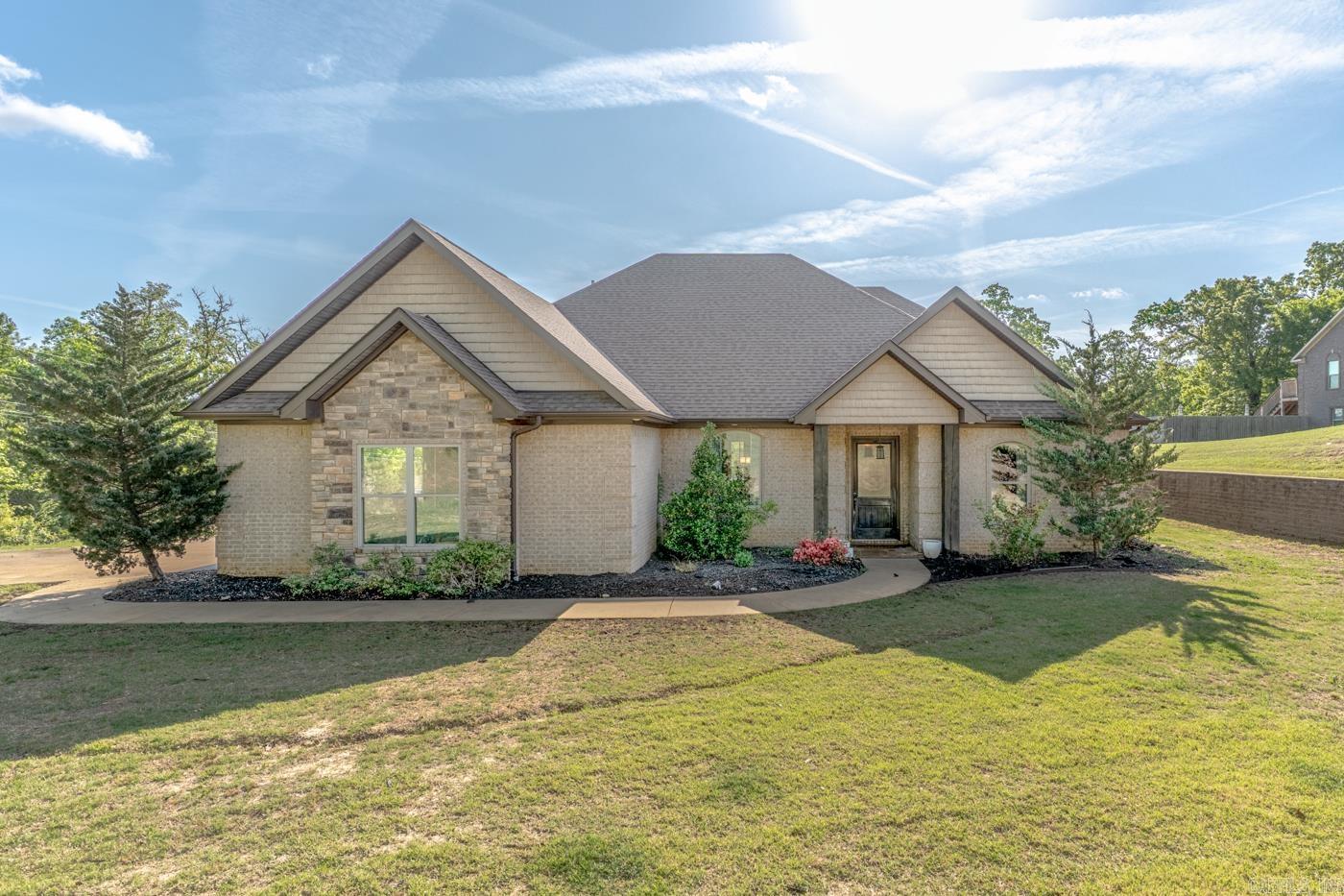 Welcome to Market 42 CR 4035 in Jonesboro, Arkansas!  This beautiful 2,600 sq ft home is nestled on 1.25 acres in a serene country setting! This thoughtfully designed 3 bedroom, 3 full bath home features a split floor plan with a private master suite on one side and two additional bedrooms with bathrooms on the other.  Enjoy low-maintenance concrete floors throughout and a spacious living area perfect for entertaining. The kitchen is equipped with new stainless steel appliances and offers plenty of space for cooking and gathering. A versatile bonus room upstairs can serve as a 4th bedroom, office, or flex space.   Relax year-round in the screened-in patio overlooking the scenic surroundings. Plenty of outdoor space with room to build a shop or additional structures. Country living with modern comfort—don’t miss this one!