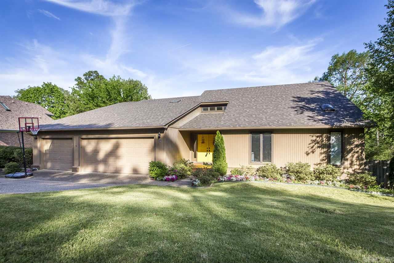 Beautifully updated contemporary home sitting in the heart of St. Charles within walking distance to the pool and tennis courts. Freshly painted throughout, new carpet, scraped hardwoods, travertine tile, granite countertops, ss appliances, new light fixtures and much more. This open floor plan has 2 bedrooms up and 3 bedrooms down. Large laundry room with separate room off of garage that would be perfect for those with a home business. A must see!
