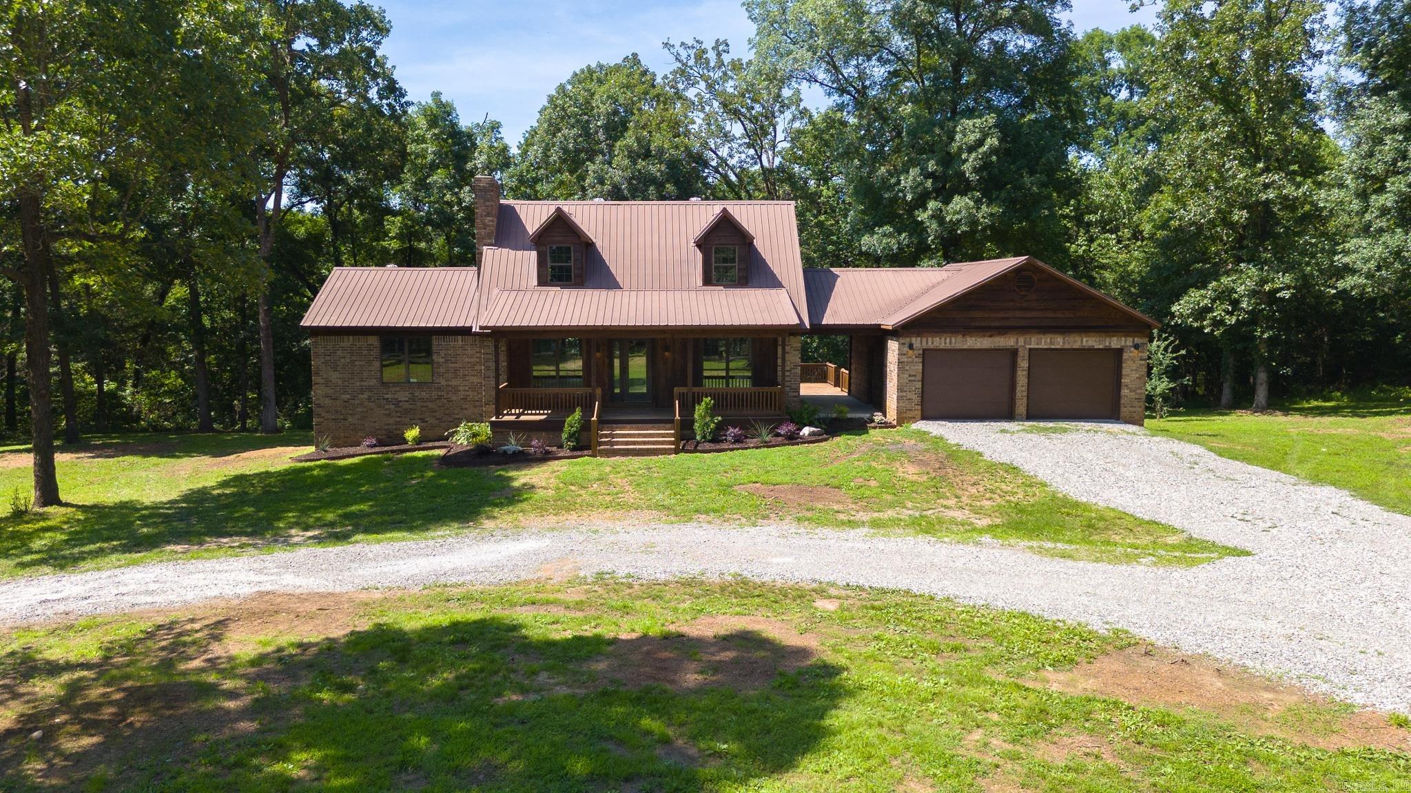 NESTELED NICELY in the middle of 20 WOODED ACRES, 125 Coronado Lane provides the perfect location for LEISURE LIVING! Recently UPDATED, this home offers a good floorplan and GOOD LOOKS! The centrally located living room with fireplace opens onto a NEW DECK to expand family activities to the great outdoors. Your NEW step saver kitchen is efficiently designed and offers everything a cook could want, new appliances, an island, pantry and ample counter space. PRIMARY SUITE with in-suite bath located on the first floor is enhanced by 2 walk-in closets, a double vanity AND a tile walk-in shower. UPSTAIRS are 2 additional bedrooms and another FULL BATH. NEED MORE SPACE? No problem! The unfinished WALK OUT BASEMENT provides over 1300 square feet of untapped potential! Let your imagination run wild! Perfect area for a game room, home office, additional living area or shop! ENDLESS POSSIBILITIES! This home is meant to be enjoyed! Call today to schedule your appointment to preview a home that offers the ULTIMATE GIFT: PRIVACY!!