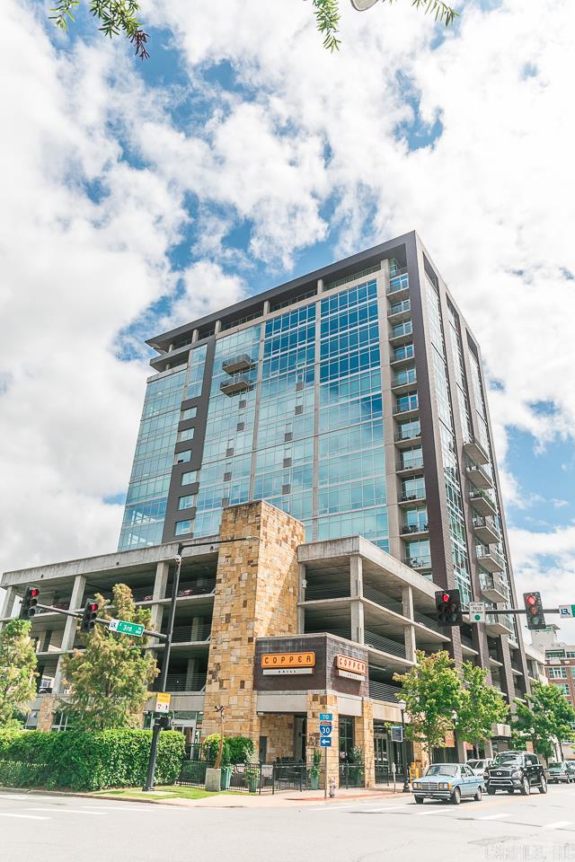 Wonderful condo w/spectacular views of city and Arkansas river.  Spacious open floorplan. Living room and dining area with walls of windows and views of the state capitol. Adjoining den w/balcony access. Office w/built-in desks. Large, luxurious master suite w/fabulous bath. Two guest bedrooms w/glass walls and full bath. Gourmet kitchen w/stainless appliances, granite countertops and every imaginable extra. Lots of storage. Crestron Home Control System. Sophisticated downtown living!