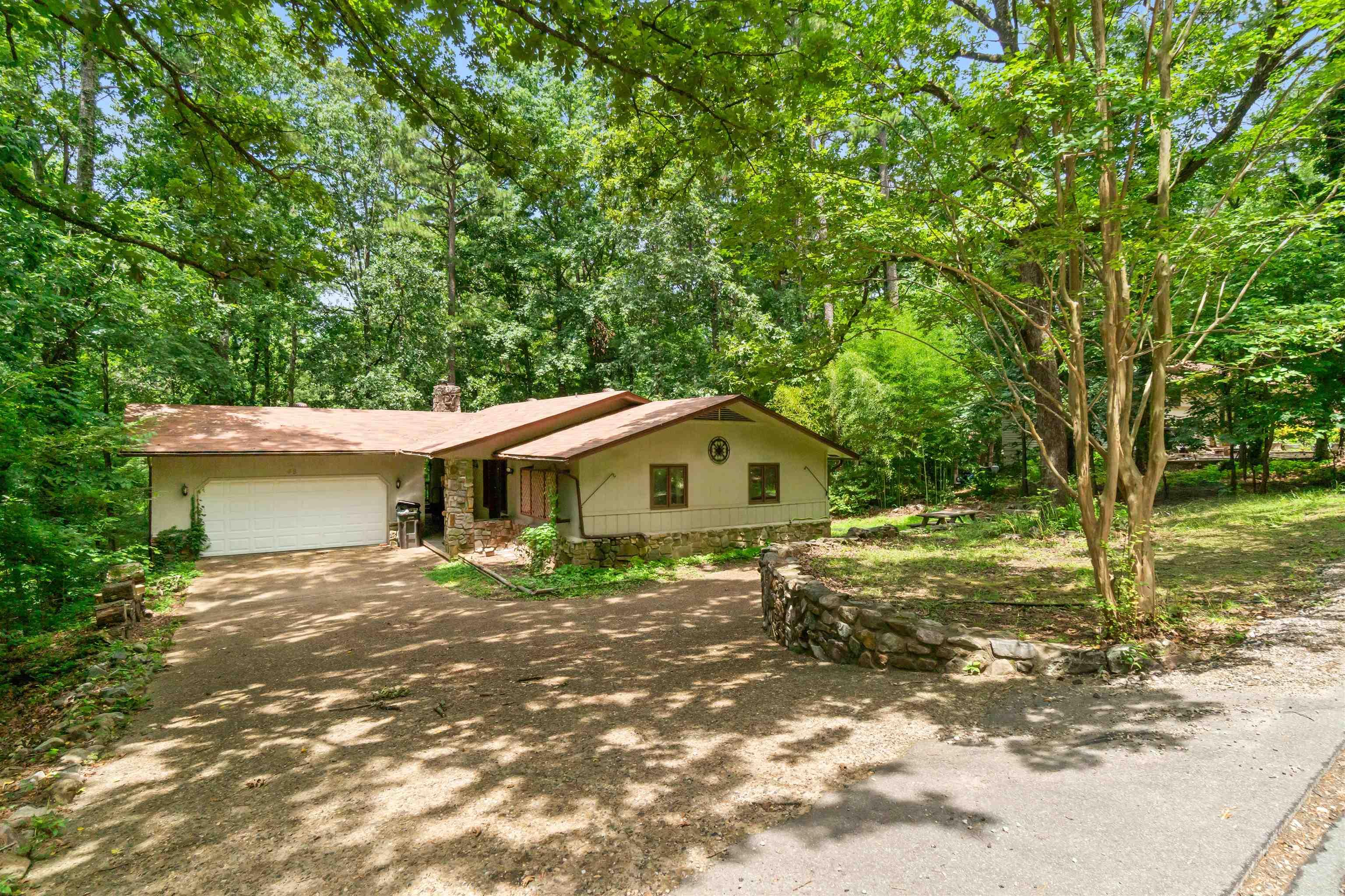 Great value in this market! Roof in June 2023. Large master bedroom. Kitchen remodeled 2020. Newer appliances. Propane range. Fireplace up and wood stove down. Common property to the right and rear. Home is being sold AS-IS. Seller requires a minimum of 72 hours to respond to an offer. No government loans VA, FHA, RD (See Agent Remarks)