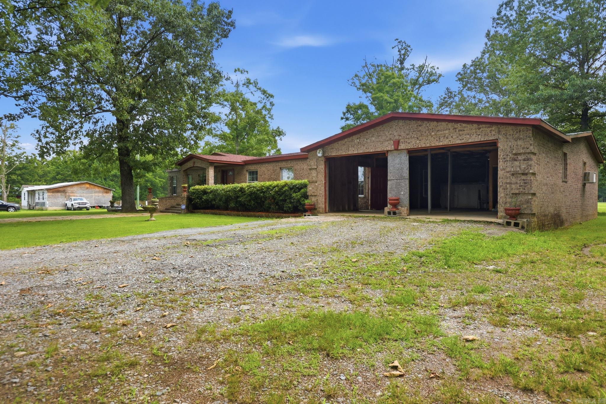 Enjoy the best of country living and convenience with this combined 6-acre offering—fully cleared and ready for development. Utilities are in place, making this an excellent opportunity for a future homesite, hobby farm, or investment. The property includes an existing 3 BR/2BTH 2,176 sq ft property and fixer-upper home (1840 sq ft) in need of repairs; being sold AS-IS. Plenty of room to renovate, expand, build a new residence, or simply enjoy the open space. Offered together (MLS #26021342 and MLS #26024379) for a total of 6 acres. New surveys for each parcel on file. SPD for 955, no SPD for 975.
