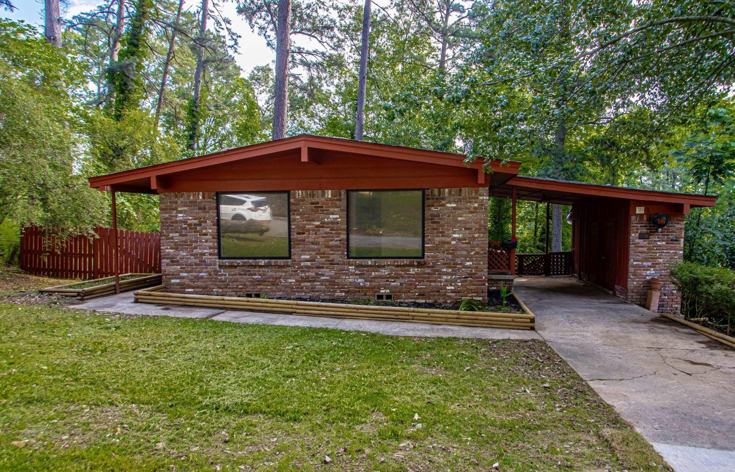 Remodeled, Move-In Ready contemporary home located near the University of Arkansas at Little Rock (UALR). ** Quiet subdivision conveniently located near shopping, dining and entertainment. ** Large Picture Windows allow for maximum natural light to the main living area ** Original hardwood floors throughout the house have been refinished. ** Granite countertops in the kitchen. New appliances, including gas range for the chef in the family. ** Remodeled bathroom with all the modern conveniences ** New fixtures throughout the house. ** Basement with outside entrance offers plenty of extra storage. Roof is 10 years old. ** The HVAC system was repaired and serviced in June 2025 for $7,000 and is in good working condition. It is under warranty for one year.