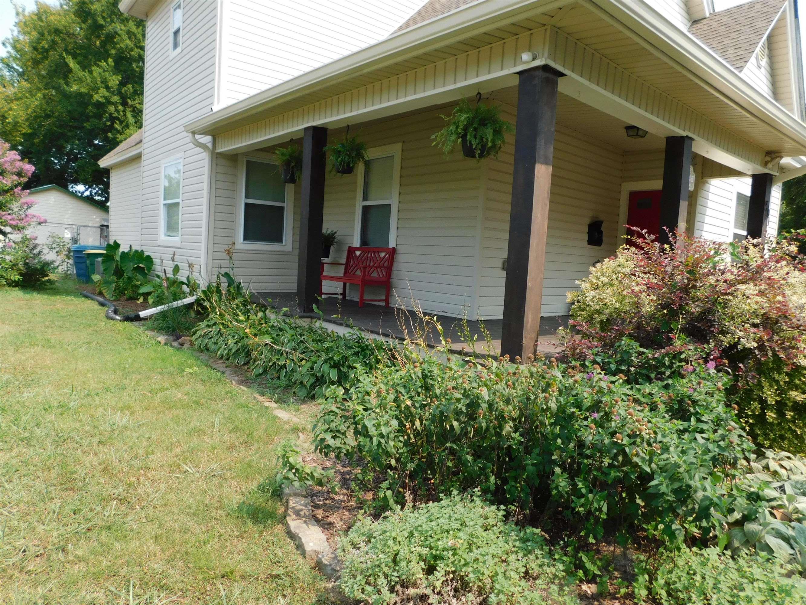 AVAILABLE NOW! Wonderful home on a corner lot, plenty of parking, wrap around porch & rear deck, fenced yard, great garden areas w/beautiful plantings, nicely painted, 4 BR, 2 1/2 bath, on-suite master DS, whirlpool tub UP, nicely furnished kitchen, large rooms & closets, wood floors in common areas, den, playroom, zoned HVAC, ceiling fans, nice lighting, well insulated. $1800 mo. Marshall Peters & Associates 501-414-8340