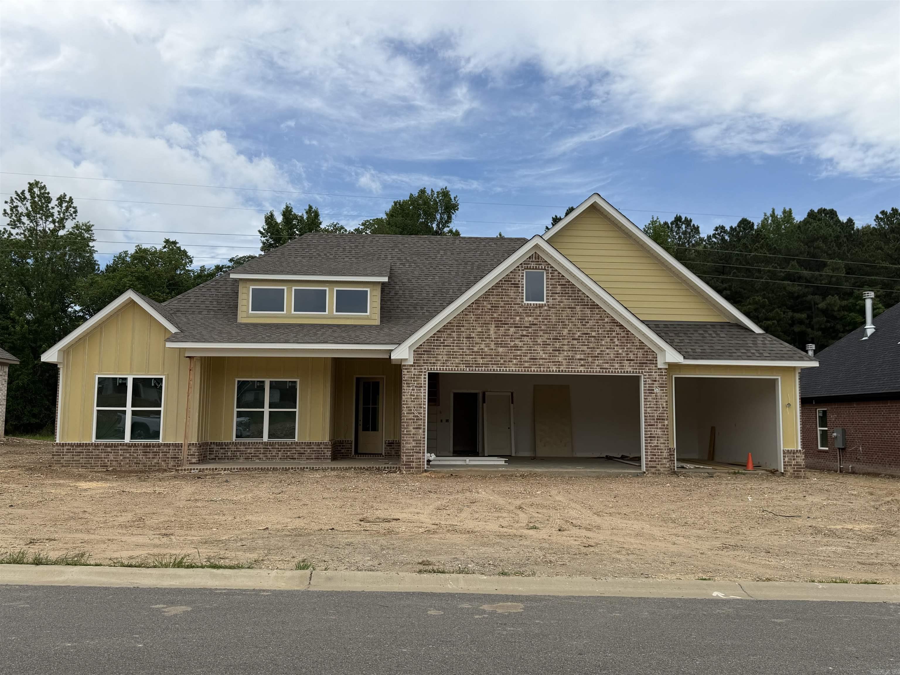 Beautiful New Construction Home located in the new  Roman Heights Subdivision.. Amenities Include: Approximately 2151 SF, 4 Bedrooms, 2 Bathrooms, Living Room with gas log fireplace, Open Floor Plan, Kitchen/Dining Combo, Living/Dining Combo, Large Kitchen Island, Breakfast Bar, Split Bedroom Floorplan, Custom Tile Shower with separate soaking tub,  Large Laundry Room, Large Pantry, LVP Flooring in main areas, Quartz Counter Tops, Drop in Gas Range, Wall Oven, Microwave,Walk in Closets, Nice Level - Large Lot, 3 Car Garage, Bryant Schools, And Much More. A Must See....