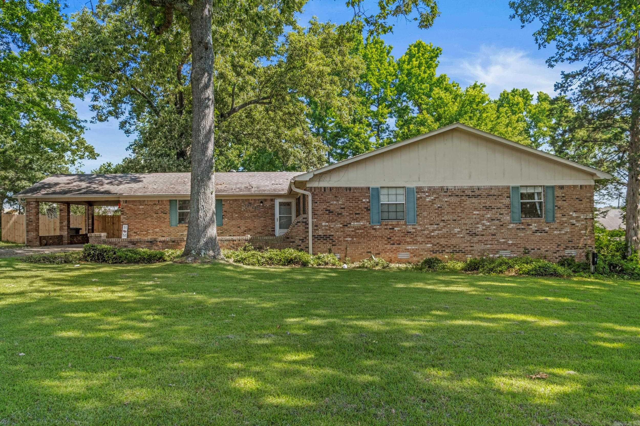 Spacious 3-bedroom, 2-bath all-brick home situated on over half an acre and conveniently located just minutes from Little Rock Air Force Base. This well-maintained property features generously sized bedrooms, two large living areas, each with its own fireplace, and a formal dining room perfect for entertaining.  Outside, you'll find a matching brick shop that complements the home's design, along with beautiful brick pavers extending from the driveway to the front entrance and carport, adding both character and curb appeal.  With plenty of space inside and out, this property offers comfort, functionality, and a great location. Call today to schedule your private showing! See Remarks.