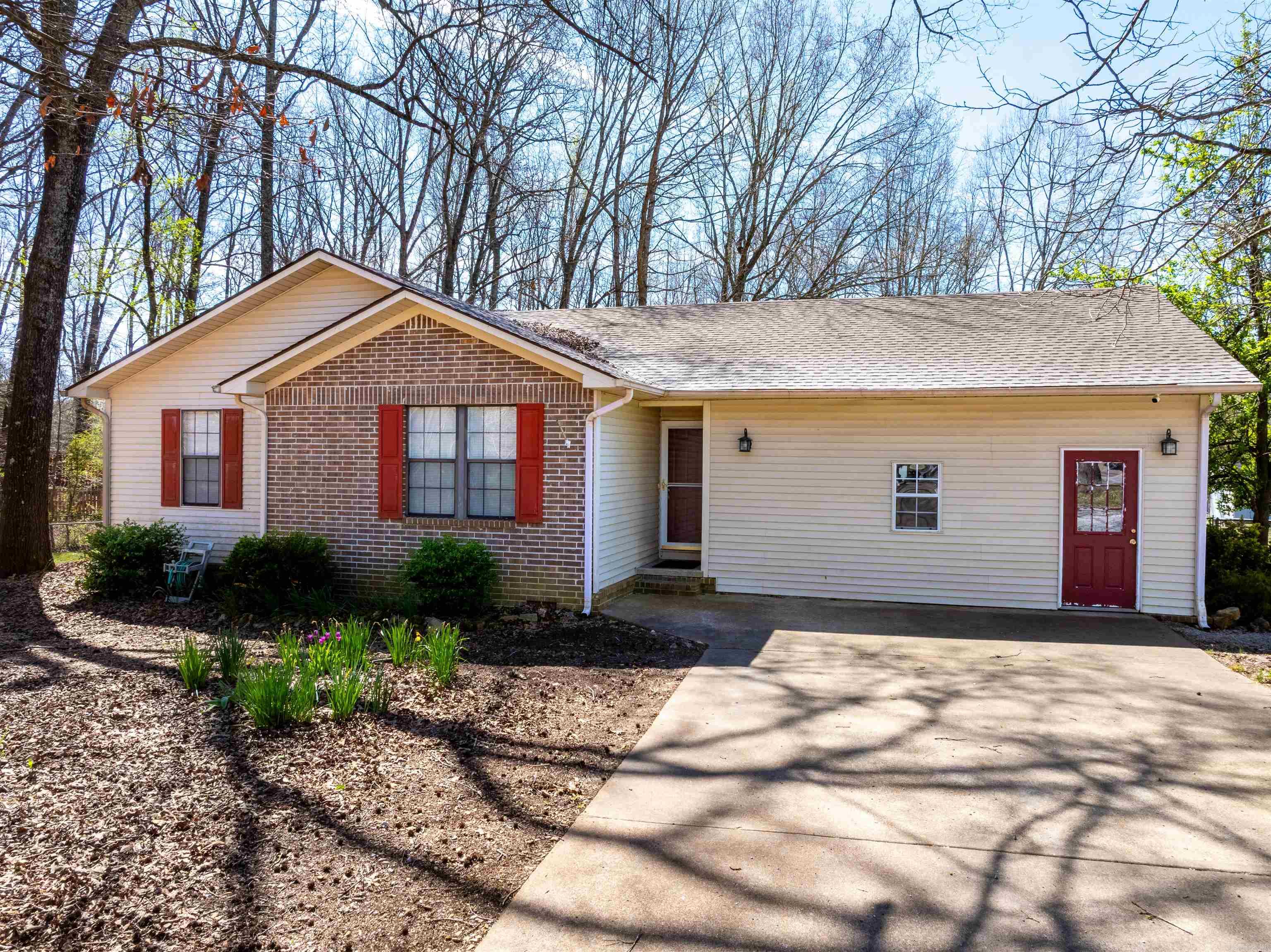 Welcome to this beautiful 3 bedroom, 2 bathroom home in Batesville, Arkansas, located in the highly desirable Pfeiffer Community, known for its peaceful setting and convenience to town.Tucked away at the end of the road in an established neighborhood, this property offers privacy, low traffic, and wooded surroundings while being just minutes from White River Medical Center, shopping, schools, and downtown Batesville.This move-in-ready home features a large fenced backyard and a spacious wraparound deck accessible from both the living room and primary suite, perfect for relaxing or entertaining.Inside, you’ll find vaulted ceilings, abundant natural light, and a cozy gas fireplace anchoring the living area. Kitchen offers an island with seating and storage, stainless appliances, gas cooktop with griddle, pantry lined with shelving, and plenty of room for gathering.The primary suite features private deck access, a large closet, and full bathroom. Two spacious bedrooms with large closets and another full bath are located down the hall.A large bonus flex area with partitioned laundry space offers endless possibilities.1,812+/- under roof/1,392+/- Heated/cooled,420+/-bonus,600+/- Deck.