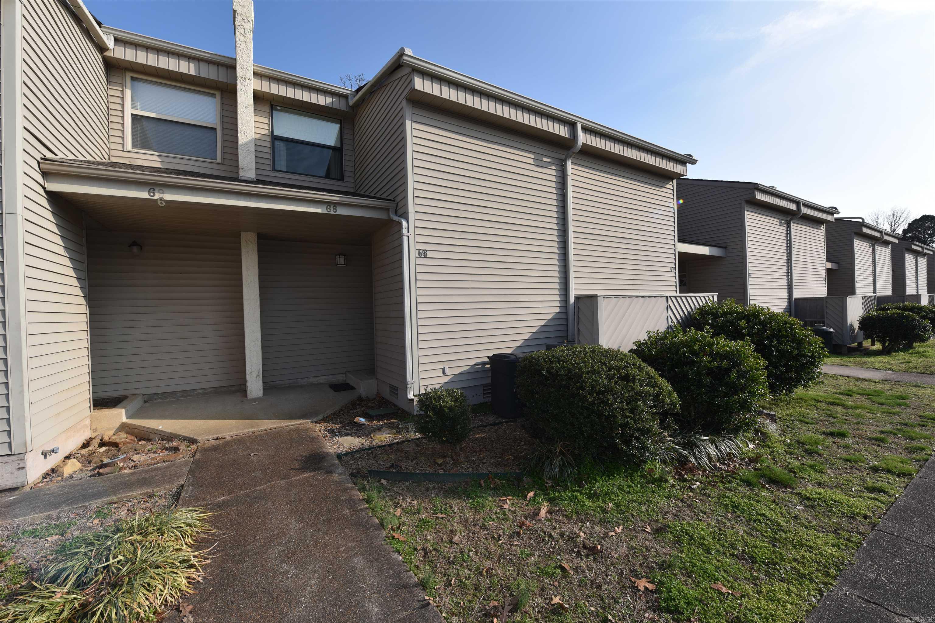 Beautifully updated, FURNISHED town home in the desirable community of Lakewood Hills in picturesque Fairfield Bay, AR.  As you enter the unit, you are greeted by gorgeous wood flooring, a fully updated kitchen with quartz counters, new cabinets & fixtures, including an undermounted stainless steel sink, upgraded lighting and an open floor plan.  The stylishly decorated unit offers ample storage, a convenient first floor half bath and a spacious deck open to a serene, wooded overlook.  As you venture upstairs, you will find a spacious, glamorous bathroom with upgraded cabinets, vanity counter & finishes.  There are two nicely appointed, spacious bedrooms with ample closet space and an additional bonus room tucked away behind barnwood doors, which could double for a bedroom or easily converted to an office.  The community features a dedicated parking space, with additional parking on the premises as well as a private pool.   Fairfield Bay is a hidden, Ozark gem nestled on the banks of the pristine Greers Ferry Lake.  Featuring 2 golf courses, three community pools, ATV trails, a full-service marina, pickle ball & tennis courts, bowling alley, a variety of dining options, & more.