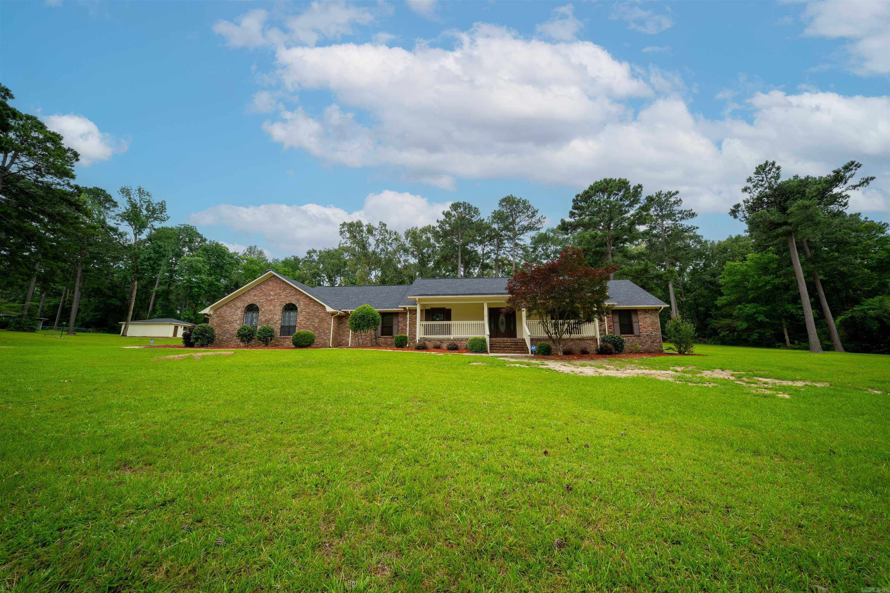 Beautifully renovated home in Camden offering space, comfort, & thoughtful upgrades throughout. Situated on approximately 3 peaceful acres, this impressive 5,000+ square foot property provides privacy, flexibility, & room to truly spread out. Featuring 5 spacious bedrooms & 4.5 fully renovated bathrooms, including an upstairs area previously used as a second primary suite, this home is ideal for guests or multi-generational living. The completely renovated kitchen includes all new appliances & updated finishes designed for both everyday living and entertaining. Multiple living spaces throughout the home include a large game room, sitting room, & workout room, providing endless options for relaxation, hobbies, or hosting gatherings. Major improvements offer peace of mind, including a new roof (2026), French drain installed in November 2025, & two HVAC systems, one of which was replaced at the end of 2025. Additional features include a generator, gas fireplace, ADT security system, ceiling fans throughout, & a huge three-car garage with ample storage. A separate bonus building offers incredible flexibility as a she shed, man cave, workshop, hobby space, or additional parking.