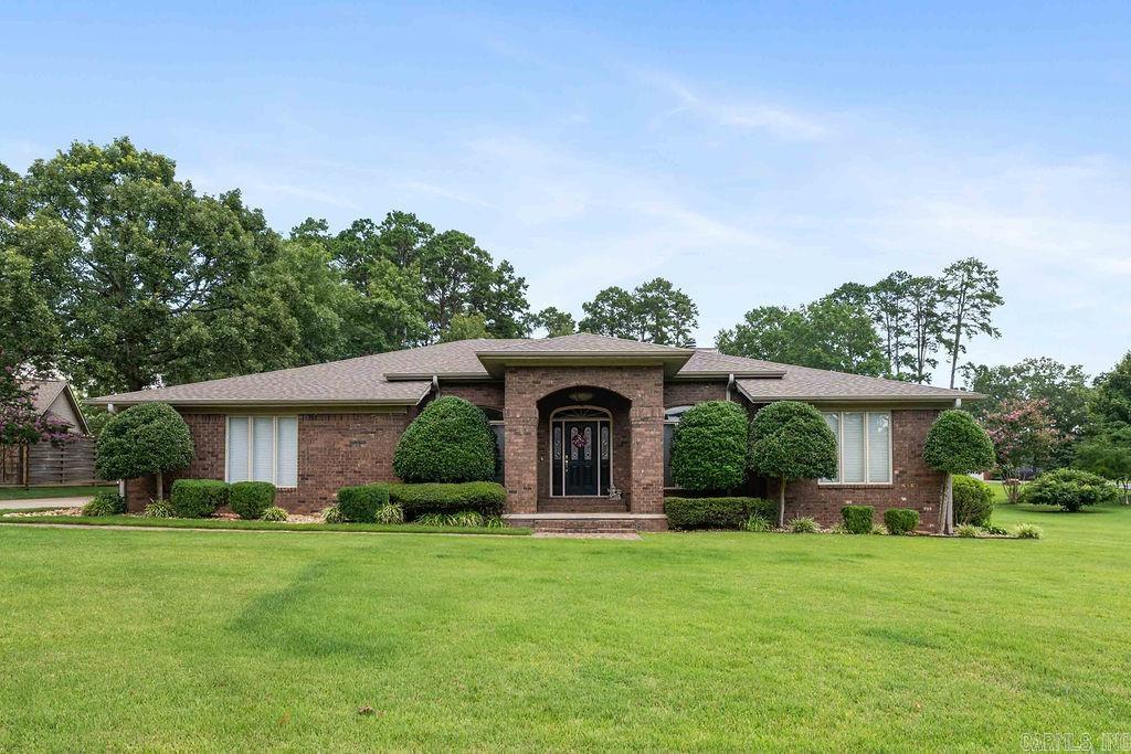 Beautifully maintained all-brick home that showcases timeless architecture!! Located in the sought after subdivision of Huntington Place in Heber Springs, this home has all the classic elegance  with a gorgeous manicured lawn.   Step inside the foyer and see an expansive living room with gas fireplace, separate  office space, dining room, and kitchen with breakfast room.  This lovely home has 4 bedrooms, 3 bathrooms and an extra large bonus space for a game room, family den, or a theatre room and a large back patio.  Close to Sandy Beach, Heber Schools and all the conveniences!!!