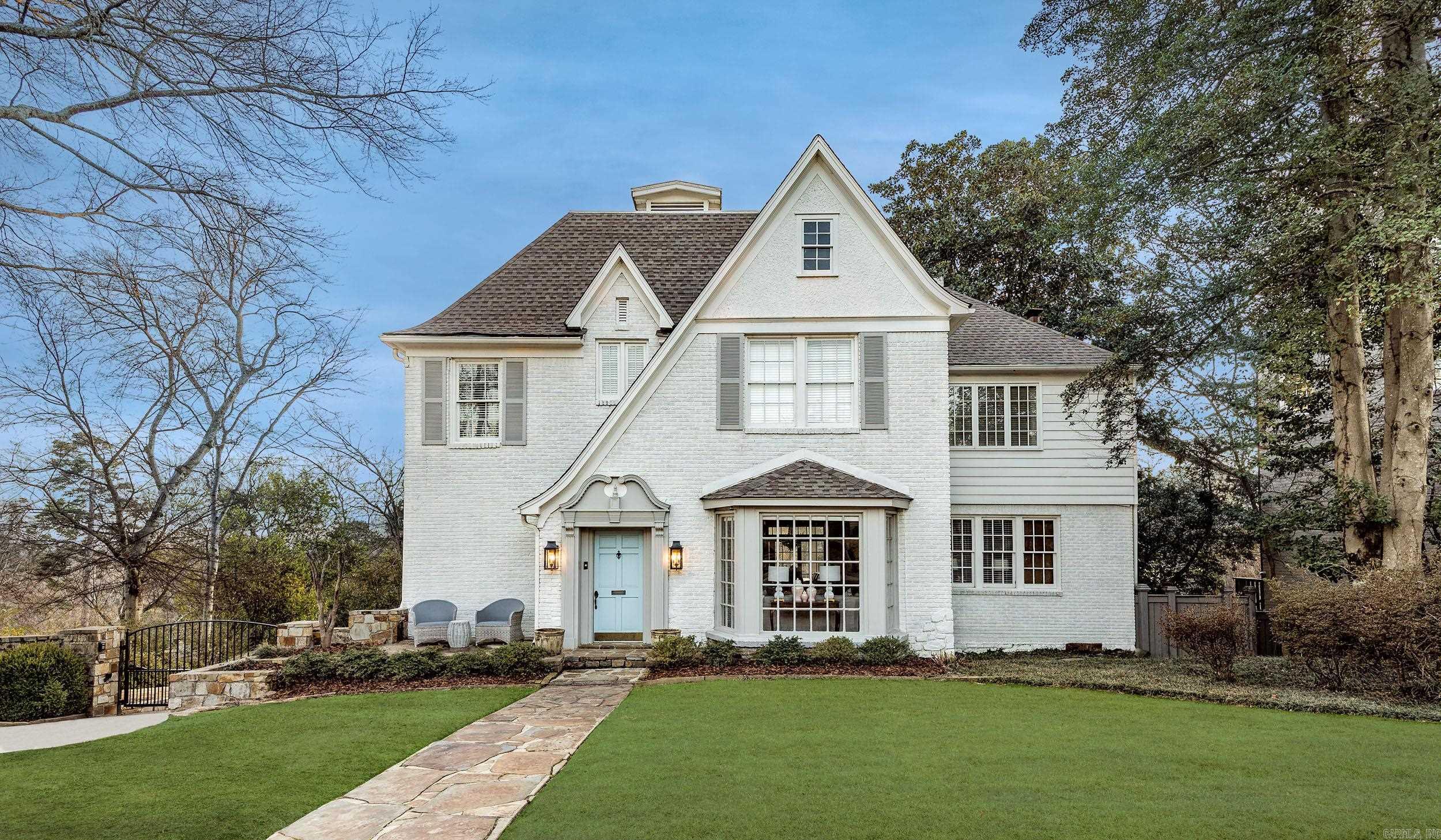 Gorgeous Heights home w/ every amenity on spectacular double lot overlooking greenspace. Handsome strt appeal w/ beautiful classic design and updated interior. Large Living Rm opens to formal Dining Rm. Sunny eat-in Kit with ss appliances and walls of windows. Upper terrace for al fresco dining. Inviting Family Rm w/wet bar adjacent powder rm. Up: Spa inspired Master Suite w/ luxurious ba & private sitting rm/office w/fp. 2 Bedrms w/ hardwd flrs share Ba. Lower level: Play Rm/4th Bdr, 5th bedrm, Bath & Den!