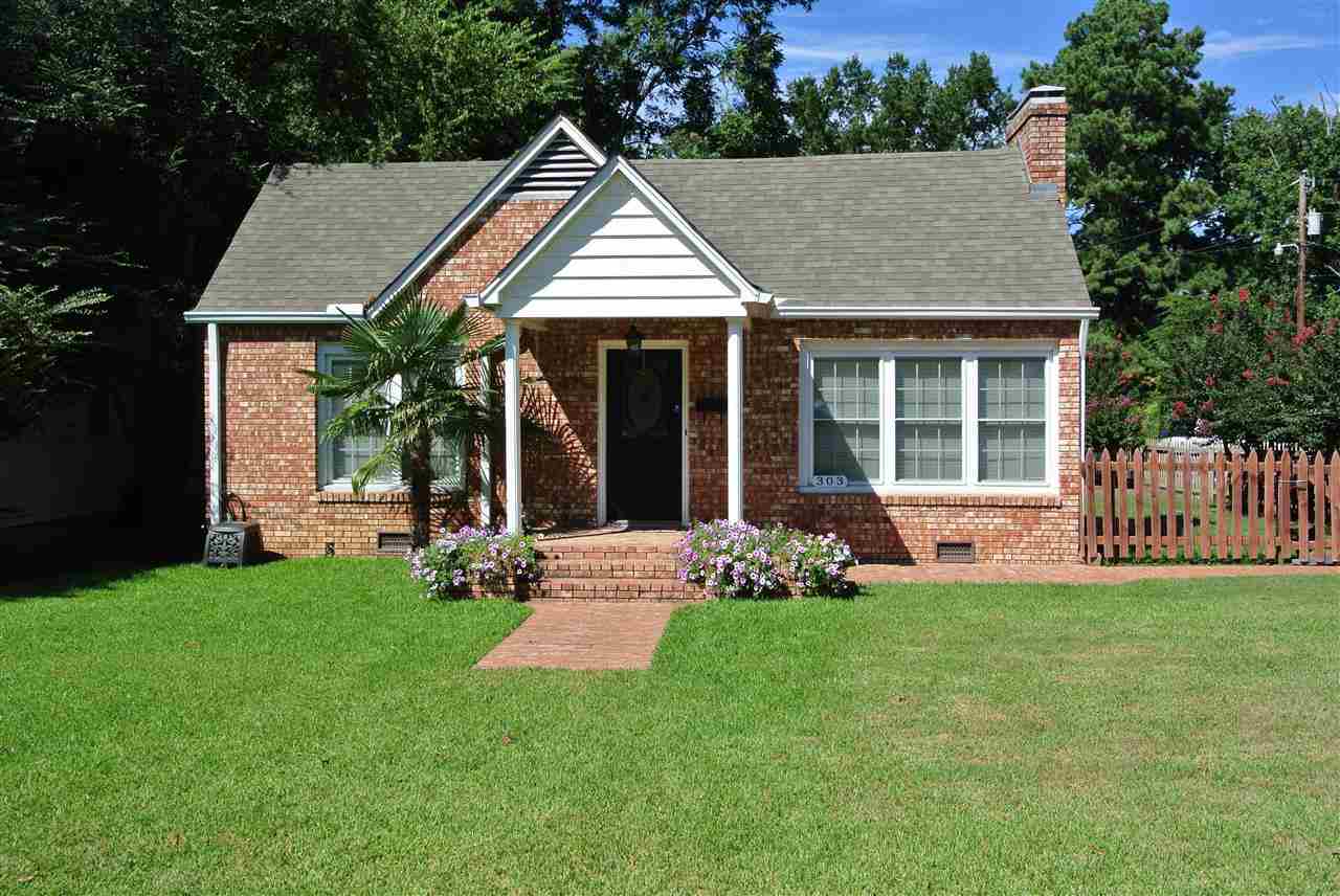 Adorable cottage on corner lot in downtown Benton! Completely updated with original charm untouched! Pictures can't capture the character of this home! Hardwoods, new carpet, virgin tongue & groove wood throughout the home. Kitchen has been redone down to wires, new custom cabinets w pullouts, granite countertops, new appliances, tons of custom details! New paint, light fixtures, huge master suite sets apart, walkin closet. Cozy covered side porch, side court yard, fenced large back yard, extra landscaping!