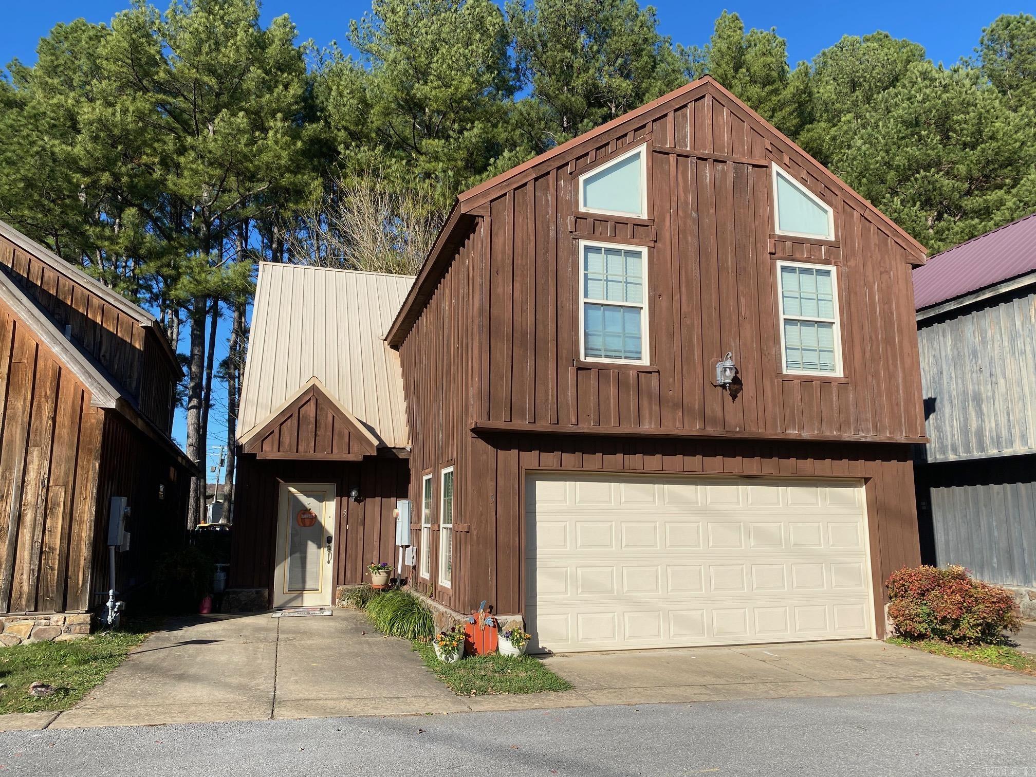 If you are looking for a place that is within walking distance to the Little Red River and want to spend all your time fishing instead of lawn work, this small river community is for you!!! Beautiful home in the Swinging Bridge Village! Close to everything, Sugarloaf, ASU College, Greers Ferry Lake, Riverland Golf Course and of course the river!!! This home boasts a garage, granite counter tops, breakfast bar, bedroom and bath on main floor with 2 bedrooms, bath and bonus room upstairs and lots of closets! Check it out!!!This property is priced to sell and would make an excellant air bnb or short term rental!!!