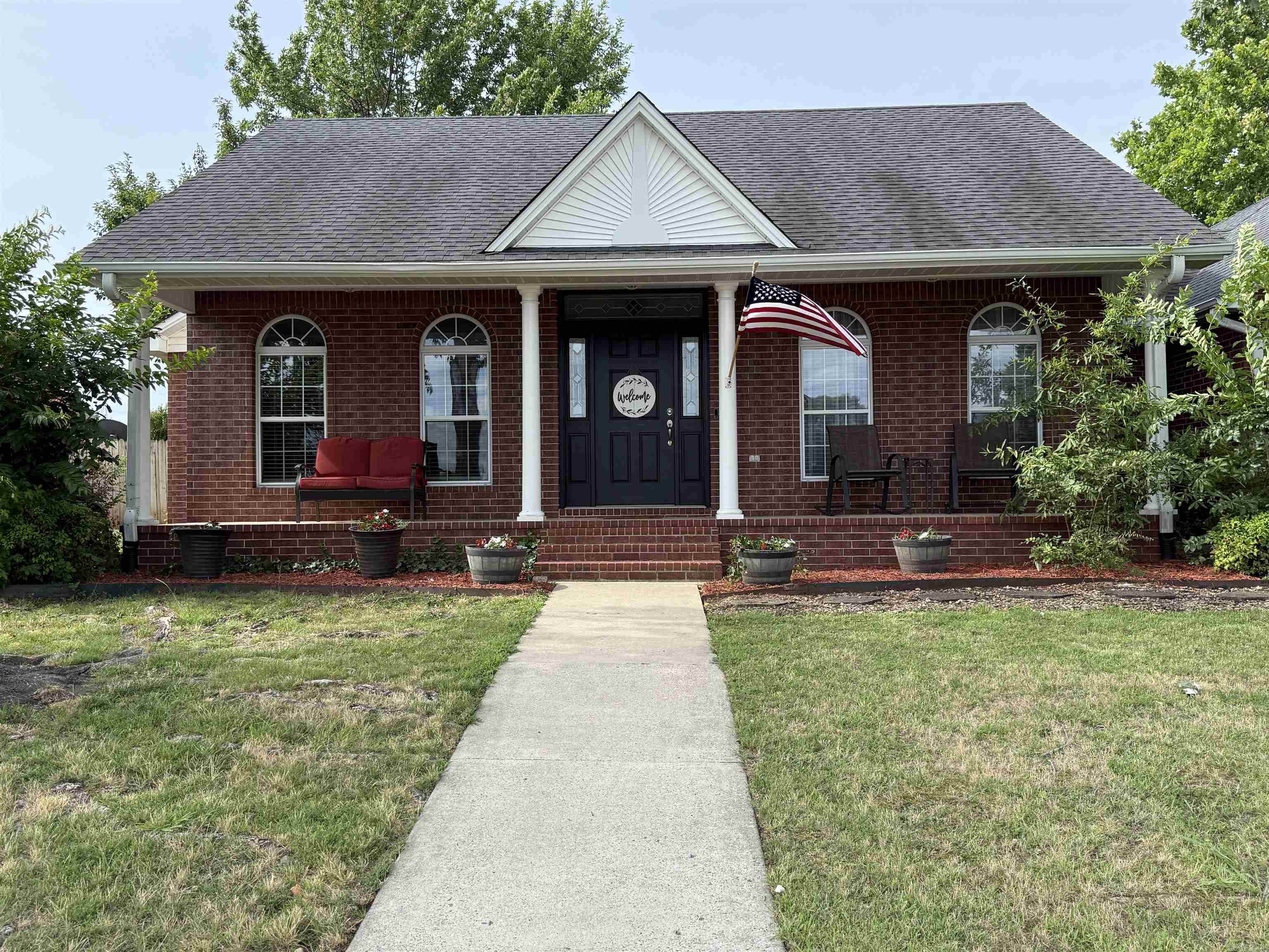 Beautifully maintained 3-bedroom, 2-bath home offering 1,678 square feet of comfortable living space with thoughtful updates throughout. Rich wood flooring, crown molding, and a spacious living room with fireplace create a warm and inviting atmosphere, while the large dining room is perfect for everyday meals and entertaining alike.  The updated kitchen is a standout feature, offering abundant custom cabinetry, granite countertops, stainless appliances, and exceptional workspace for cooking and gathering.  Step outside to your own backyard retreat featuring a fenced yard, mature shade trees, a partially covered deck, and an in-ground pool with a liner replaced in 2023. Whether you’re hosting friends or enjoying a quiet evening outdoors, this space was made to be enjoyed.  Major updates include a roof replaced in 2019, interior updates completed in 2019, and a new water heater installed in 2025. Located in an established neighborhood, this move-in-ready home combines timeless charm, quality updates, and outstanding outdoor living.