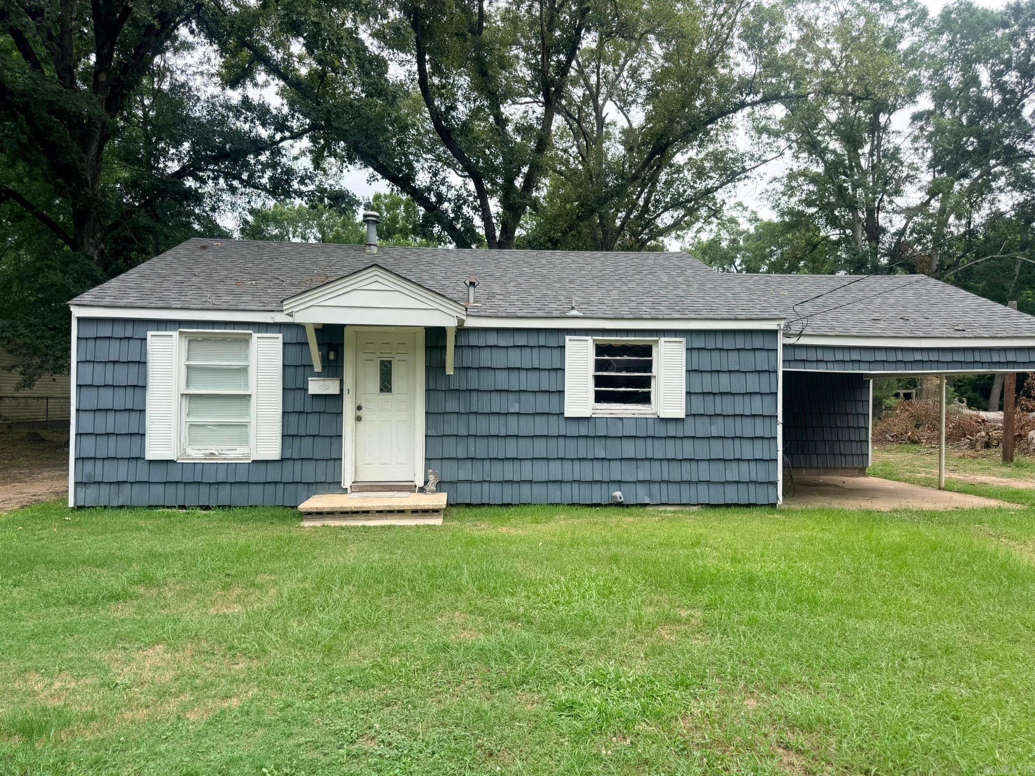 Cute and affordable 2 bedroom, 1 bath home in Camden that is move-in ready with room for improvements. Sitting on approximately 0.44 acres, this property features a partially fenced chain-link backyard, covered attached carport with side-entry access, attached carport storage, and a storage shed with lean-to that’s perfect for yard supplies, a mower, side-by-side, or outdoor equipment. Perfect for a first-time homebuyer or investor!