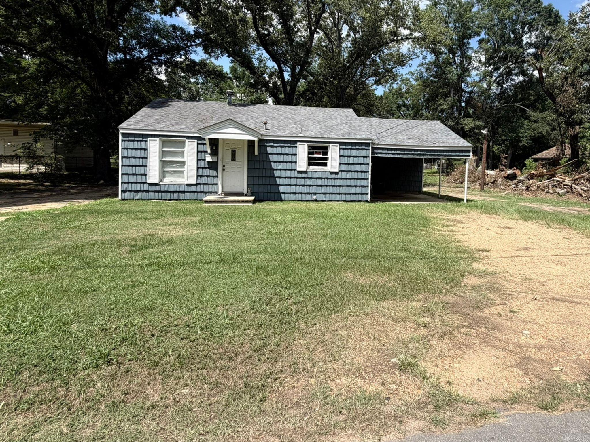 Cute and affordable 2 bedroom, 1 bath home in Camden that is move-in ready with room for improvements. Sitting on approximately 0.44 acres, this property features a partially fenced chain-link backyard, covered attached carport with side-entry access, attached carport storage, and a storage shed with lean-to that’s perfect for yard supplies, a mower, side-by-side, or outdoor equipment. Perfect for a first-time homebuyer or investor!