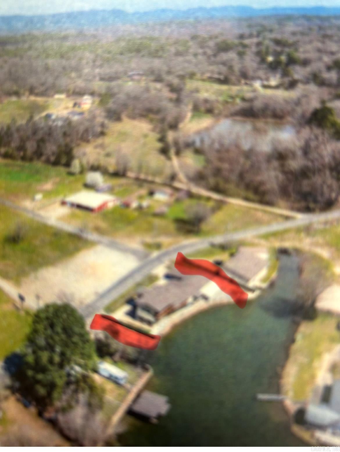 LAKE HAMILTON WATERFRONT...133 TREASURE ISLE ROAD, HOT SPRINGS, AR... 4,648 sf Home...2,160 sf Shop (easily converted to another dwelling)...PLUS RV Garage...BUY ALL OR PART (Buyer's Agents see AGENT REMARKS).  ideal for a nightly rental, family retreat or commercial development (Great Highway Exposure). Main House 4 Bedrooms (2) Master Suites.  4.5 Baths.  SEE DETAILED SPECS IN THE LAST (2) PHOTOS.  Owner may consider short-term financing.
