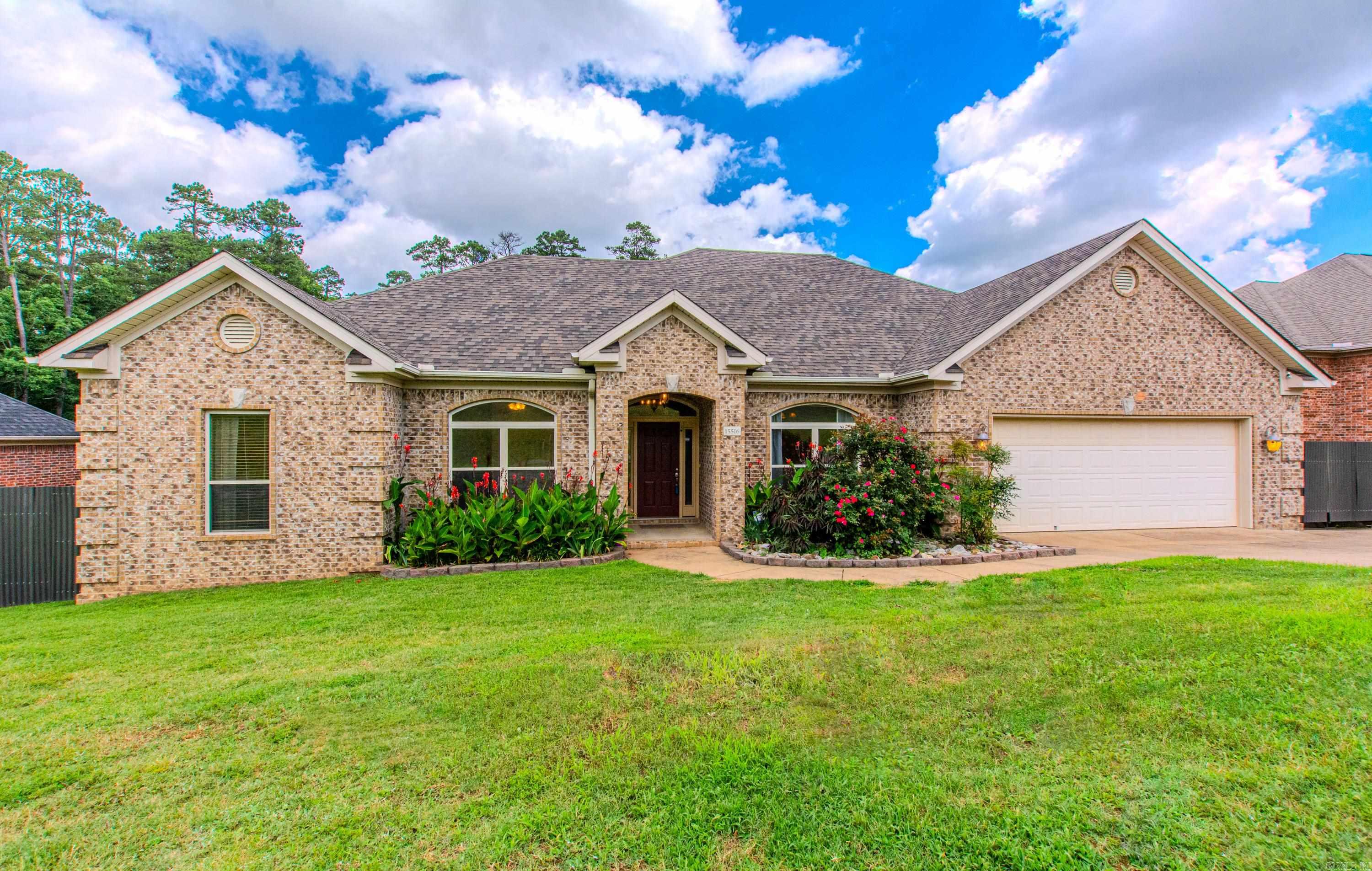 Retreat to this lovely 4 bedroom, 2.5 bath home with a formal dining room, and a nice breakfast room.  Kitchen has a breakfast bar and granite countertops.  Nice sized living room with a beautiful fireplace with gas logs.  Hardwood floors and LVP in the main bedroom.  Crown molding.  10 foot ceilings & tray ceilings in LR & primary bedroom.  Enjoy the natural light coming into this home with an arch window on the front and a big window on the back. Great floor plan with 3 bedrooms on one side of the house.  The backyard retreat currently has a forest view with utility easement behind the property.   There is a 220 outlet in the garage.  Extra parking on the right side.  There was an above-ground pool which has been removed and the dirt was seeded for grass.  Both sides of the house have good yard space with big gates on each side for access.   Come watch the wildlife from your breakfast room.    Roof was replaced in May of 2019.