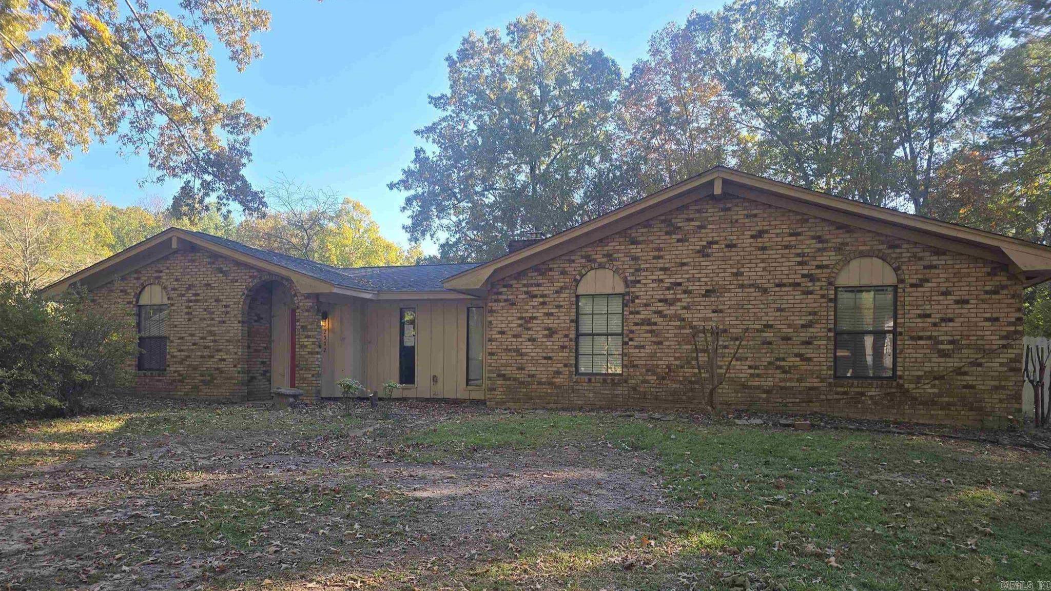 3 bedroom, 2 bath home located in a quiet subdivision just off Hwy 104 in White Hall. The property features a wood-burning stove, spacious living areas, and a functional floor plan. Includes a 2-car garage, fenced backyard, and a storage building in the rear. Situated on a corner lot, this home offers a great opportunity for buyers looking to add value, as some work is needed. Convenient location with a peaceful neighborhood setting.  AGENTS SEE REMARKS