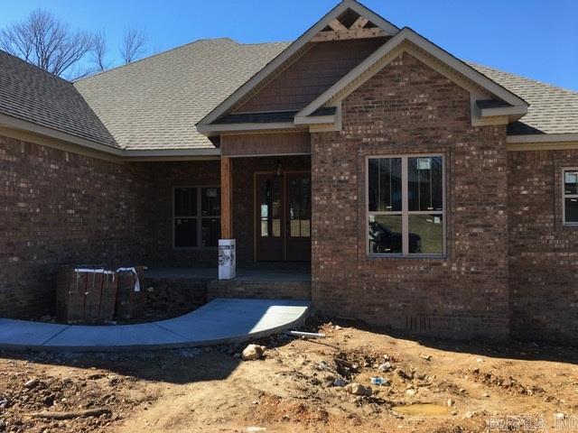 Elegant new construction with a wonderful open floor! Richly adorned throughout with crown, granite, and hardwoods! The kitchen features a huge granite island and painted cabinets & pantry. Formal Dining and large eat-in area also. Spacious greatroom with a wall of windows overlooking elevated deck & oversized back yard. The Grand master suite will wow and pamper you! Large laundry with mud room and lockers. Large dbl-door underhouse concrete floored storage area and a large covered back deck! Classy Home!