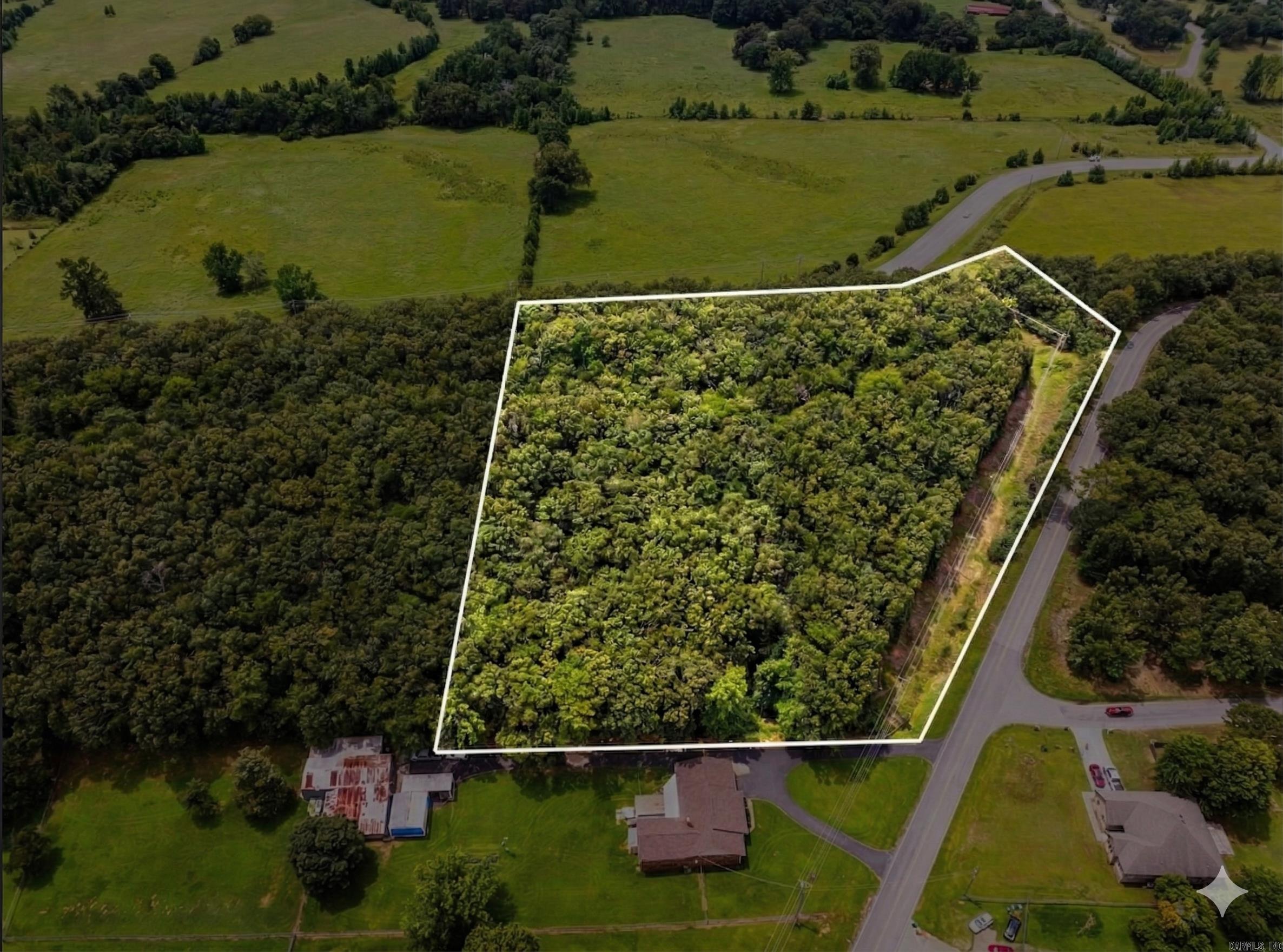 Discover the perfect canvas for your dream getaway with this nearly 6-acre property, created by combining two exceptional lots. Offering highly desirable dual access from both Batesville Pike and Old Tom Box Road, this expansive tract provides incredible flexibility for your driveway and site layout. It is the absolute perfect setting to build a custom cabin or peaceful countryside retreat, featuring an ideal building site that perfectly overlooks beautiful, lush green pastures. Don't miss this rare opportunity to secure a large, accessible tract with picturesque views—bring your builder and your vision today! see also MLS#25038664 and 25038660