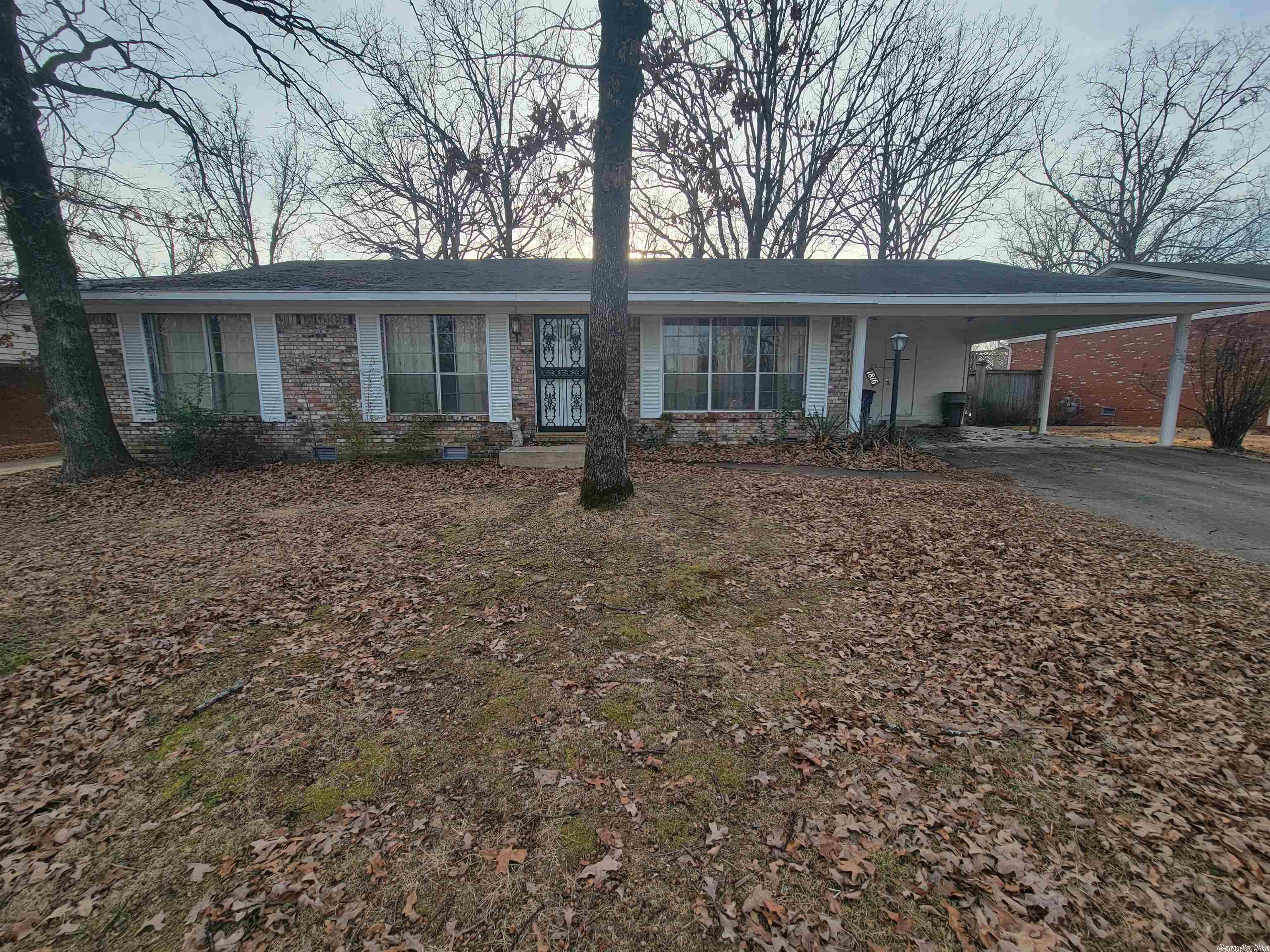 One story brick home with two car carport located in Indian Hills subdivision. There are three bedrooms, 1 full bath and 1 half bath. Large back yard with 2 storage sheds. This property would make a great starter home or investment property. Call today for a showing!! Flooring Allowance being Offered - See Agent Remarks!