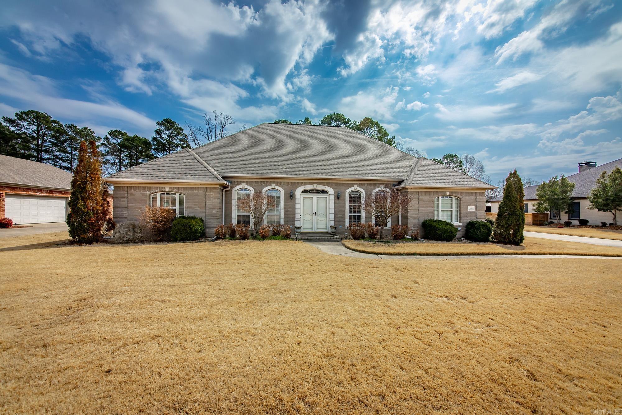 Luxury living meets breathtaking golf course views in this stunning 4-bed, 3-bath home perfectly positioned along the 17th fairway. With approx 3,000 square feet of thoughtfully designed space, this home offers room for everyone while maintaining an elegant, welcoming feel. The spacious living area is anchored by a beautiful gas fireplace & filled with natural light, creating the perfect setting for both entertaining & everyday comfort. Downstairs features no carpet offering both style and easy maintenance throughout the main living areas. The kitchen is a true centerpiece, featuring granite countertops, an island, stainless appliances, cabinet pullouts for pots and pans, & a new cooktop You'll also appreciate both a sunny eat-in kitchen and a formal dining room for hosting special gatherings. The primary suite is a private retreat with a cozy sitting area and an impressive wall of closets designed for exceptional storage. Upstairs, a versatile bonus space offers endless possibilities — media room, playroom, or home office — along with abundant storage throughout the home. Complete with a 3 car garage, this home has everything you could ask for.
