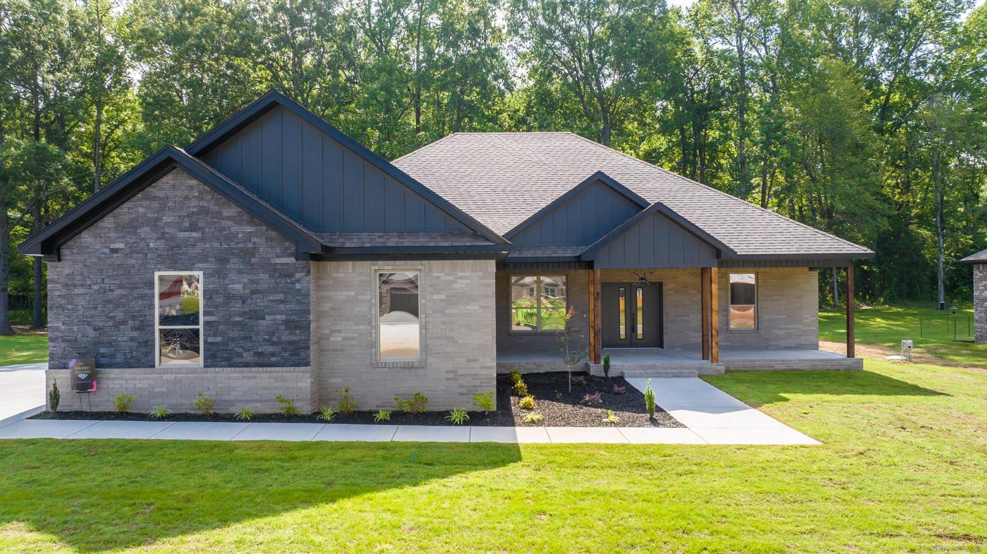 One of your last chances to own a new construction home in Mt. Tabor Estates before its fully developed. This 2423 sqft home features 3 large bedrooms & an office that can serve as a 4th bedroom. 2 full custom bathrooms, with tiled walls, shower glass in both. 2 different Quartz countertops, modern plumbing & lighting fixtures & stainless steal appliances. Custom modern cabinetry throughout with more storage space than you can imagine. The laundry room (108 sqft) features floating shelves & lots of cabinet space. Tile in all wet rooms and LVP flooring throughout other areas of home. Walk in pantry. The master closet with a makeup vanity is large enough to turn into a bedroom. With right at 800 sqft of garage space you wont run out of room for all of your outside items. The front and back porch are both covered totaling 786 sqft! Dont miss your chance to make this custom home yours! Call today for more info.