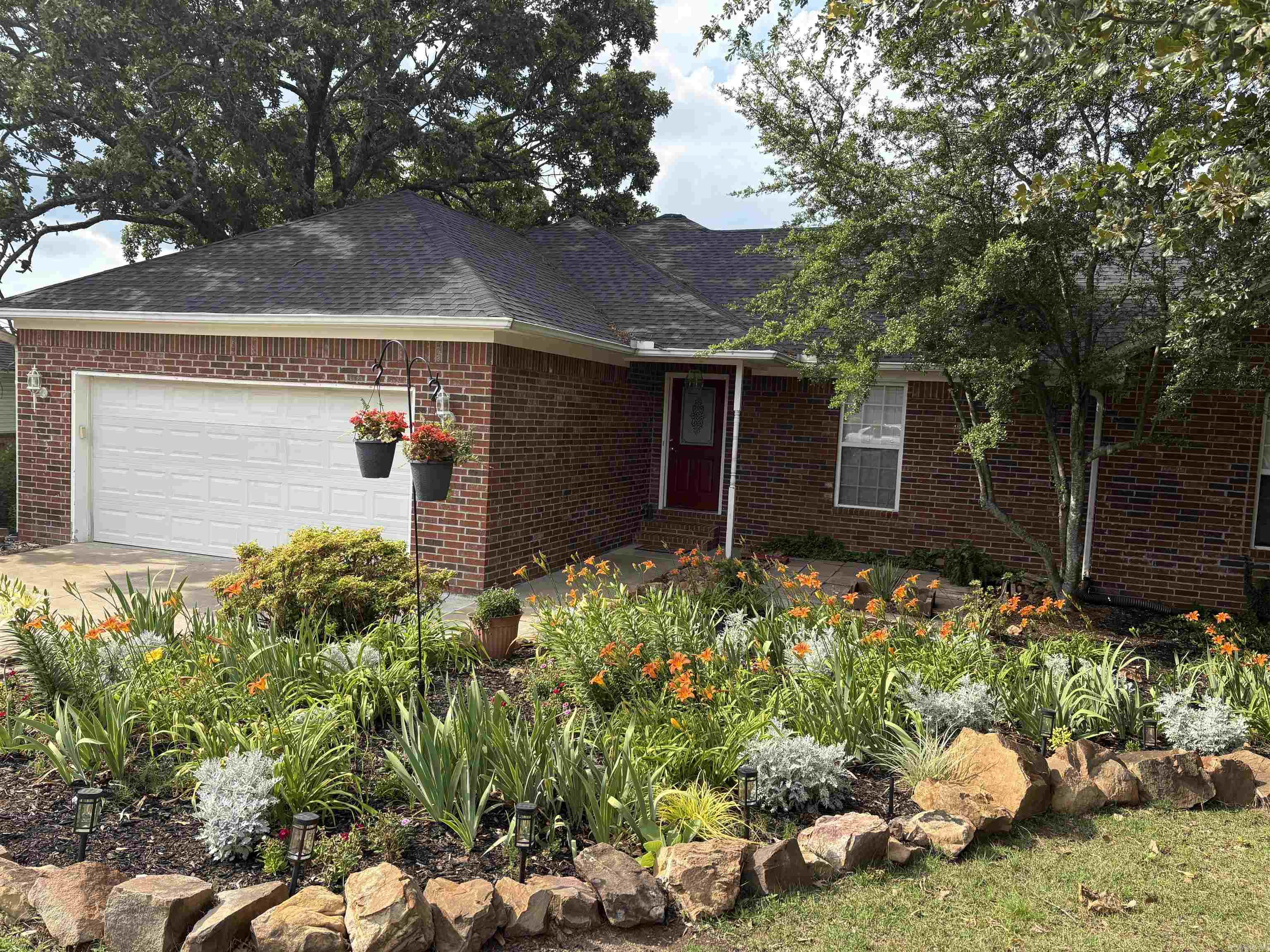 Bright, cheerful home on a quiet cul-de-sac. Lovely flower beds, a recently remodeled kitchen, cedar paneling in the closets, tankless water heater, and - a rare find in Conway - a finished basement! Schedule your showing today! Agents, see remarks.
