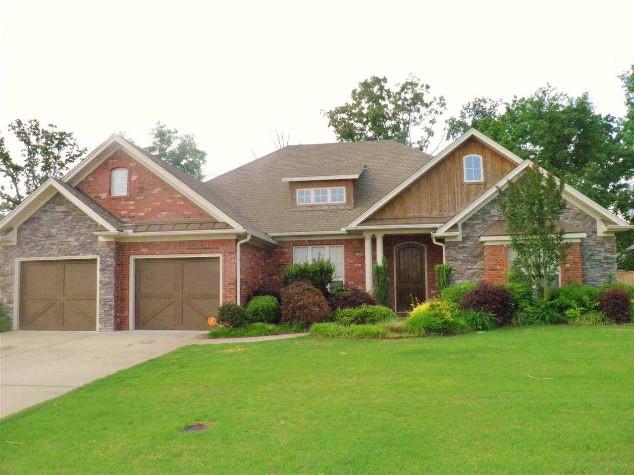 Wide open space. Beautiful wood cabinetry, columns & trim. Gorgeous granite countertops, sitting on handscraped hardwood flooring.  Split floorplan: 2 bedrooms w/Jack n Jill bath, 1 bedroom convenient to guest bath w/outside access to pool/patio.  Master suite features nice crown molding. Master bathroom has French doors, center mounted jet tub, large shower, separate vanities & closets. Bonus room upstairs with great storage.  Kidney shaped pool has slide with water feature..very nice! See agent remarks.